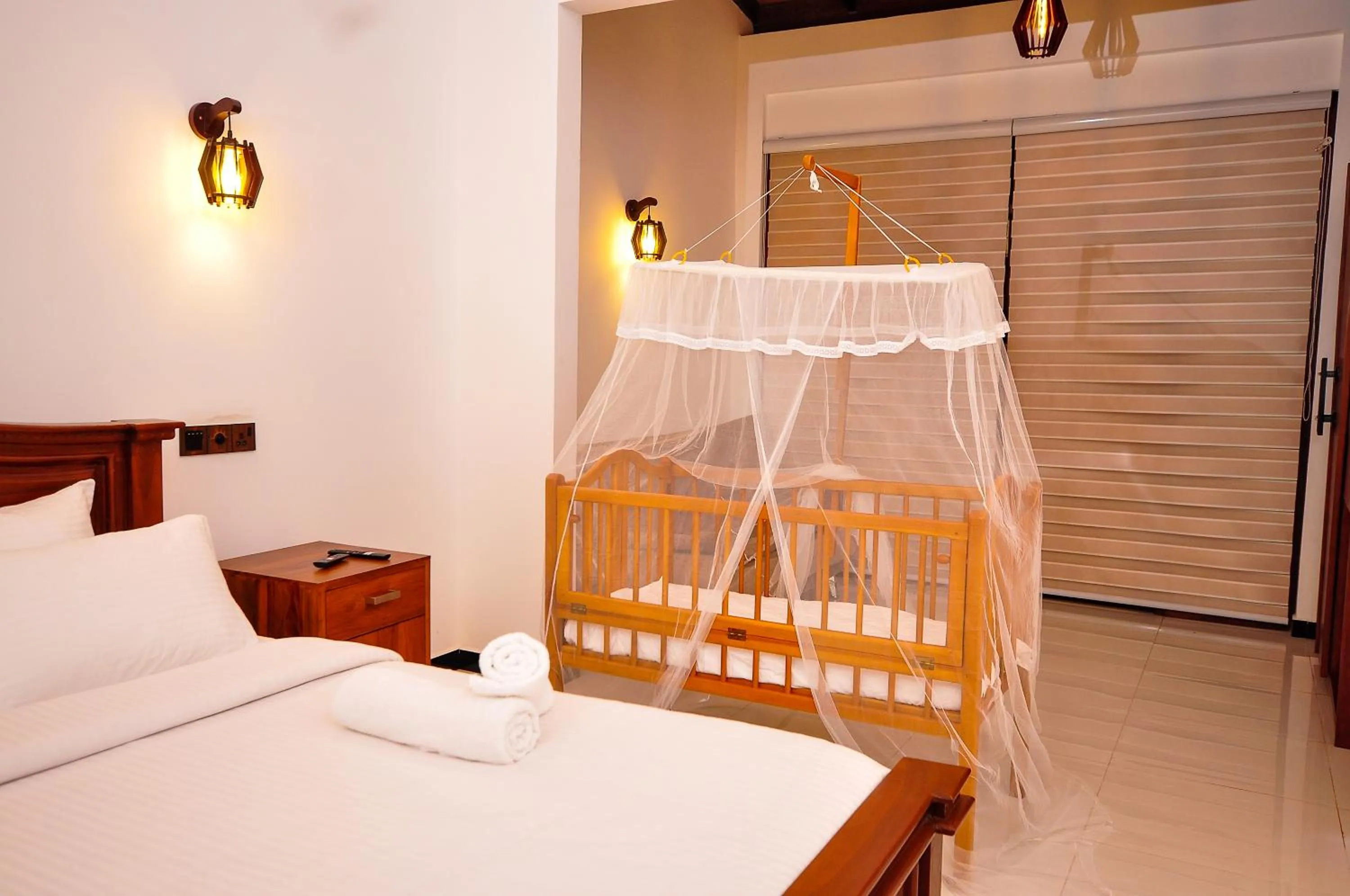 Bed in Sachinro Hotel Mirissa