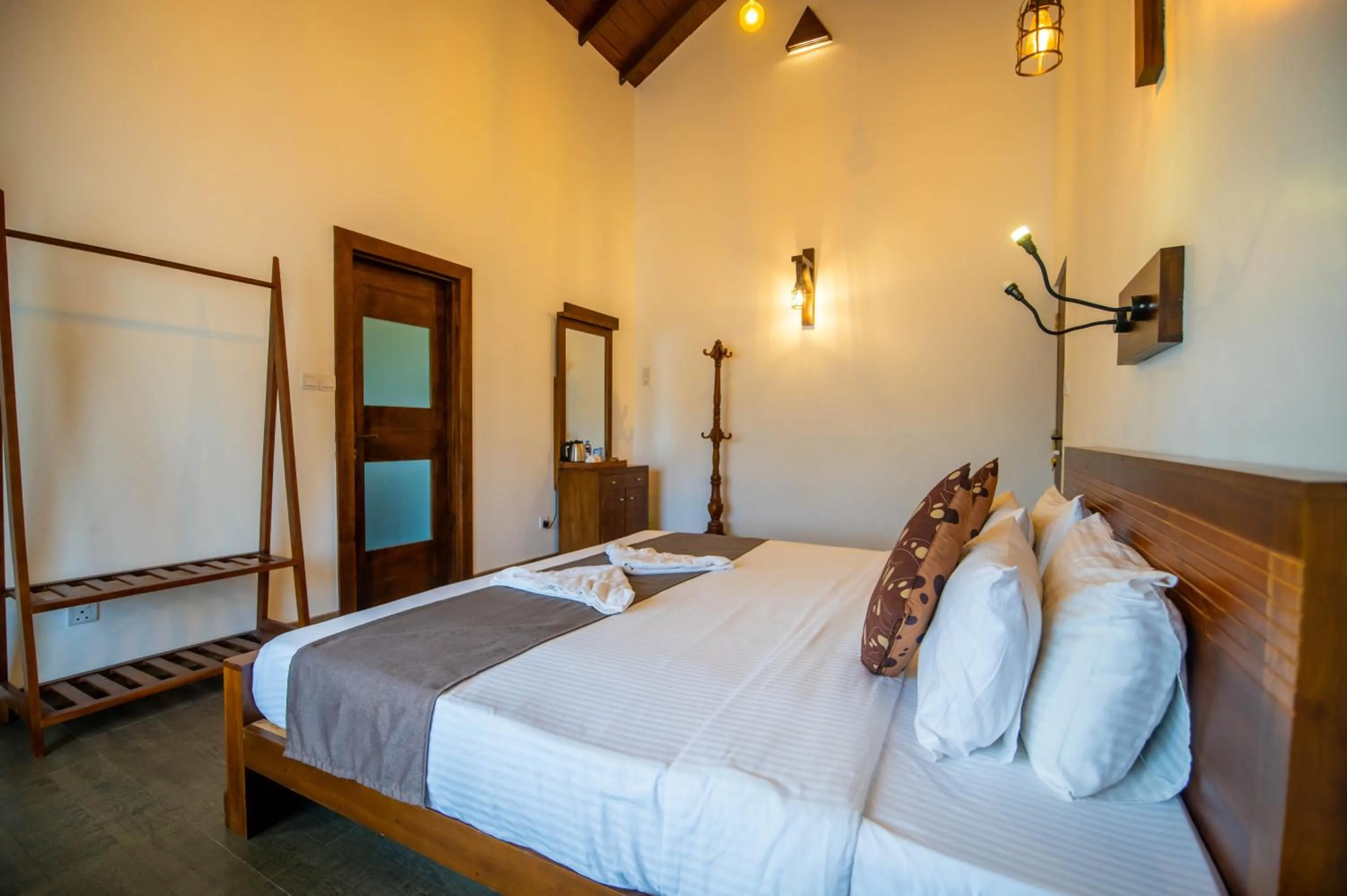 Bed in Grand Argyle Resort