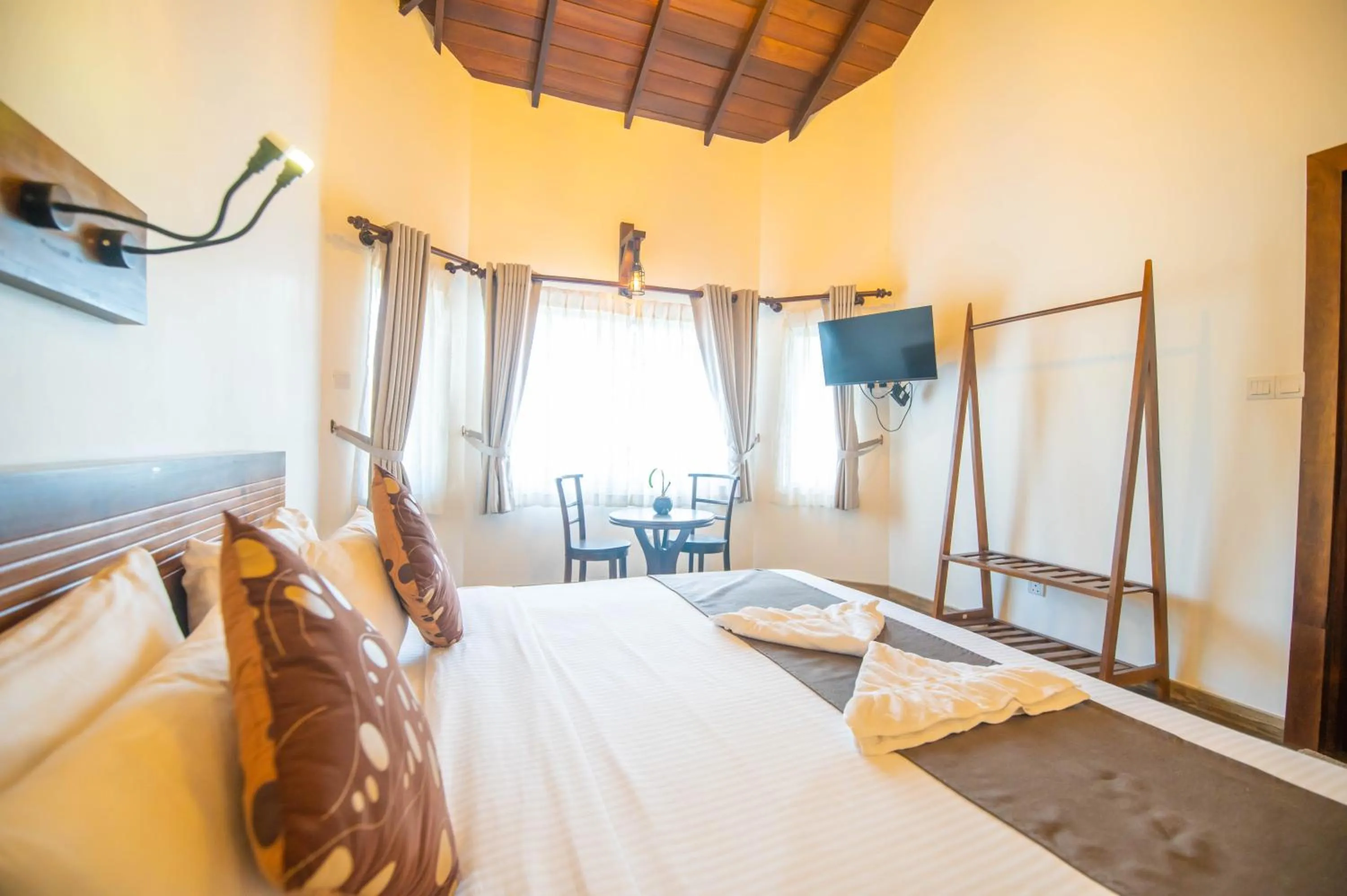 Bed in Grand Argyle Resort