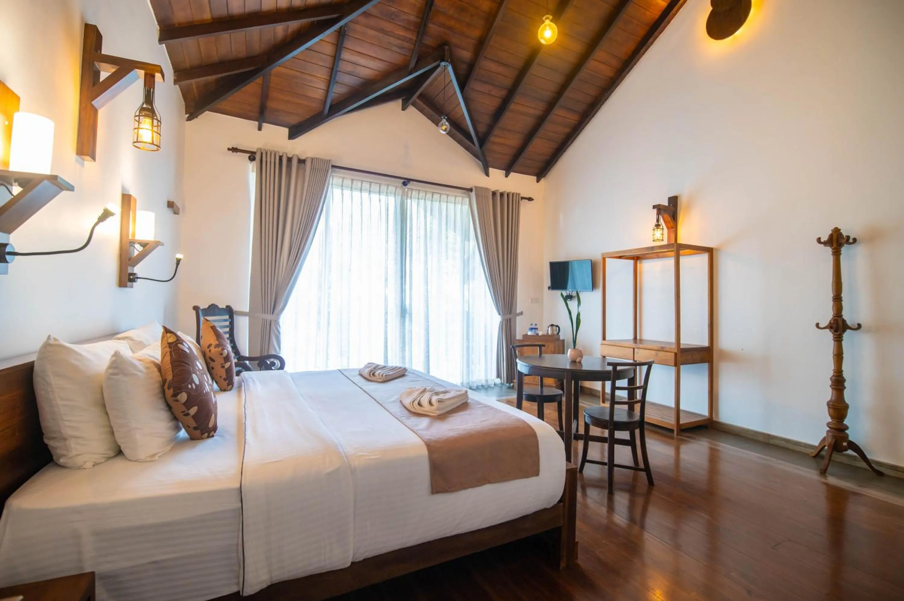 Bed in Grand Argyle Resort