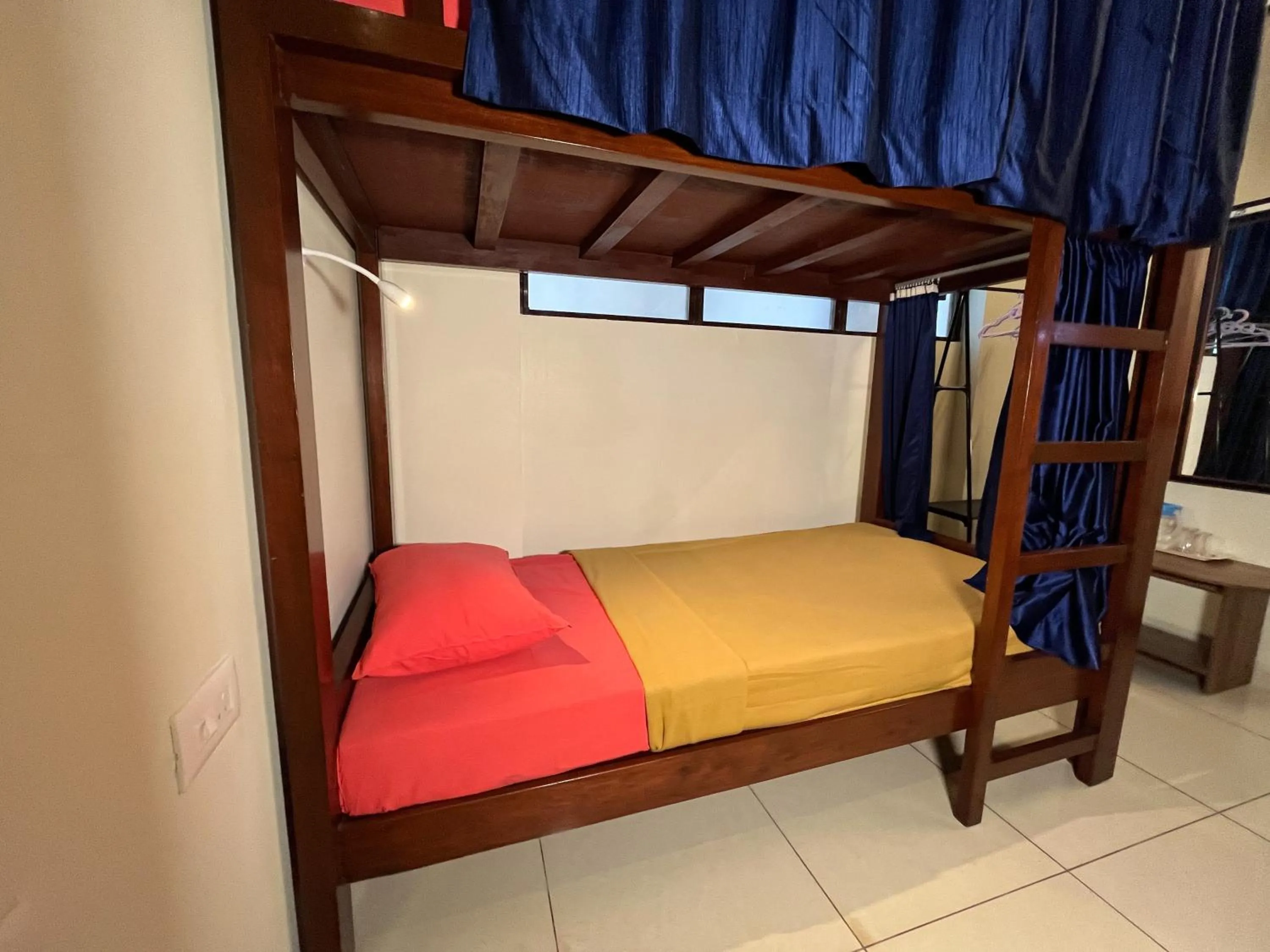 Bed in Bay Stays near white town