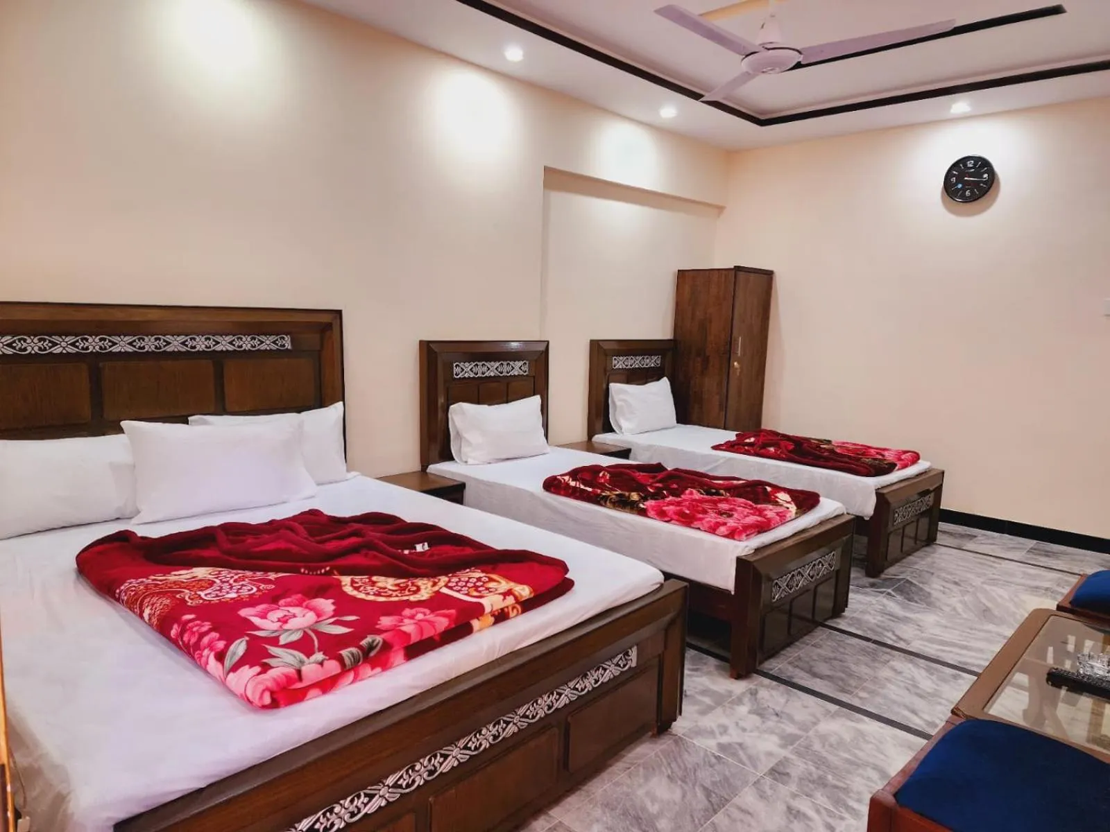 Bed in New Palace Guest House