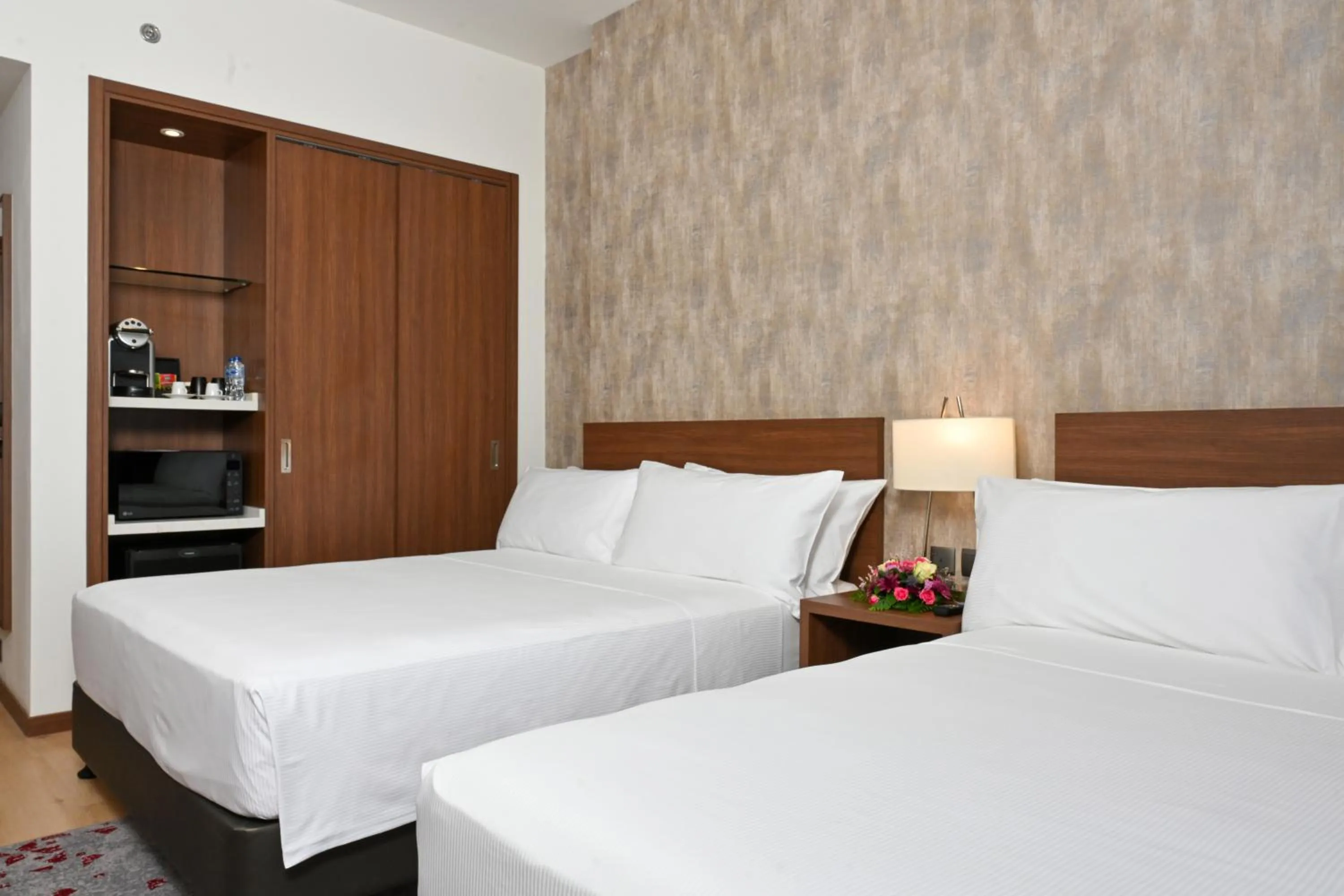 Bed in Comfort Hotel Riyadh Olaya