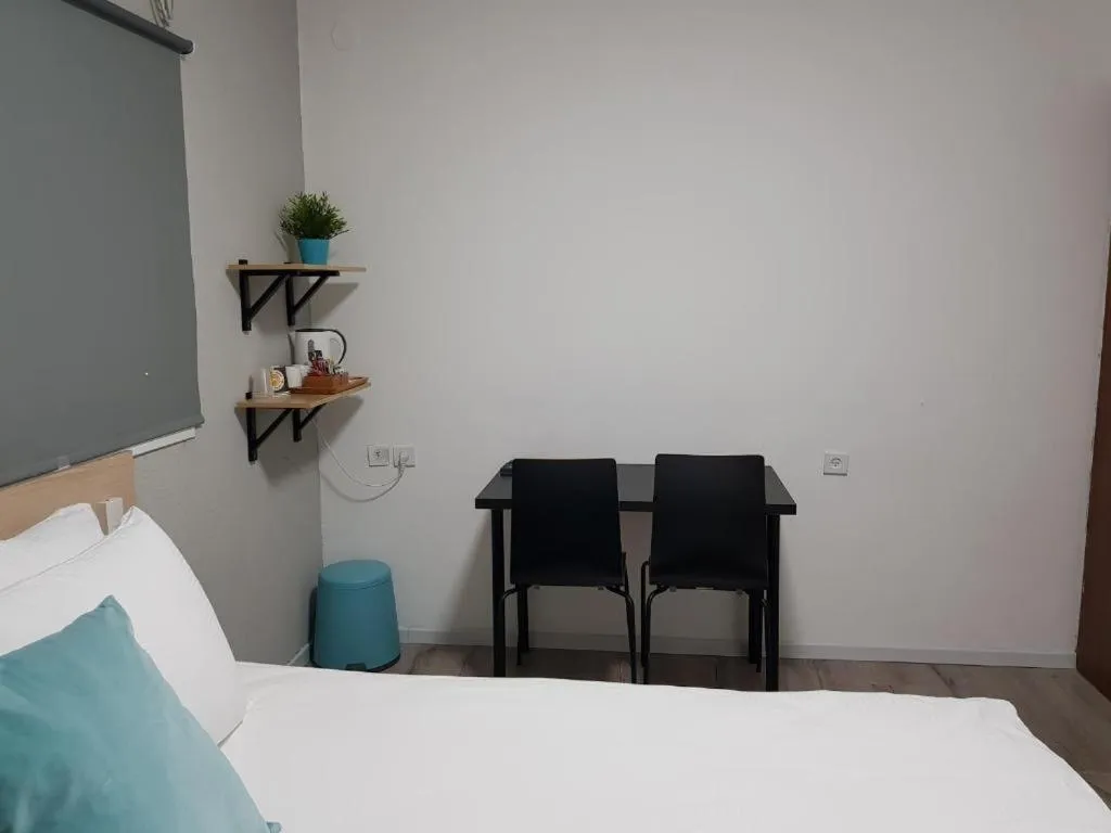 Bed in Airport Guest House