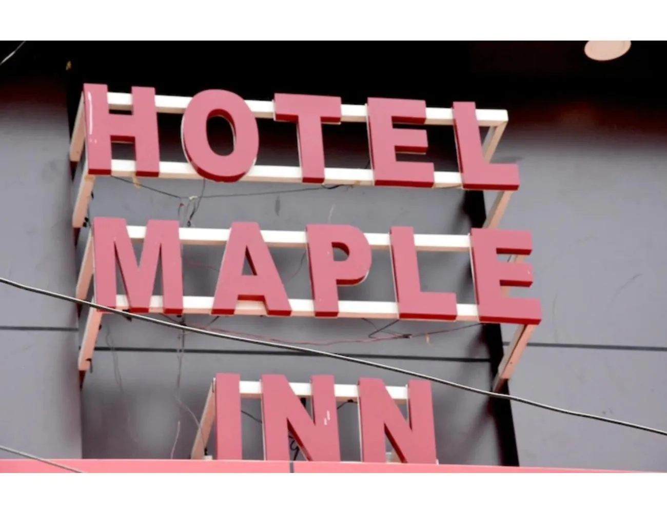 Property logo or sign in Hotel Maple Inn, Patna