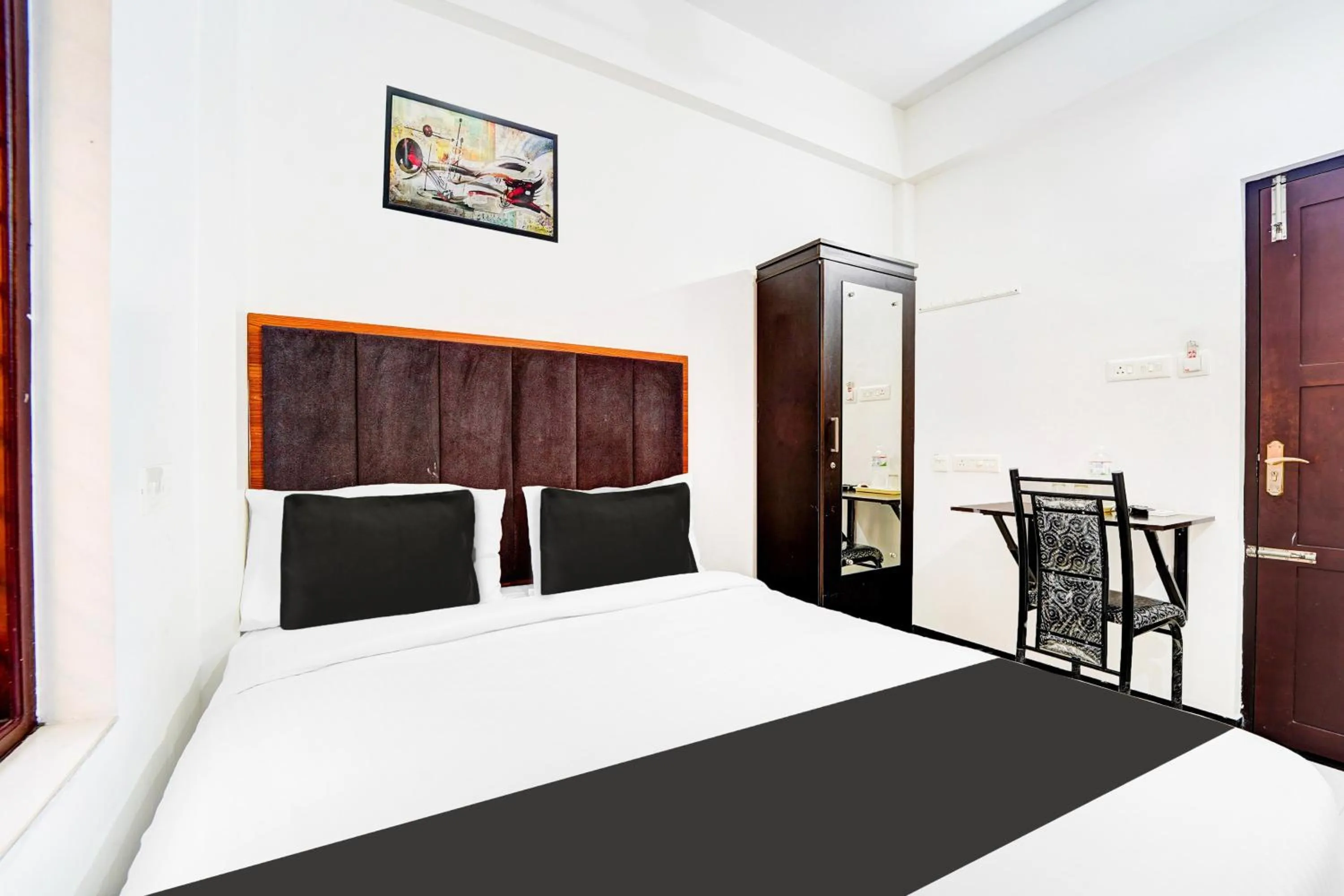 Bedroom, Bed in Super Hotel O Attukal Near Attakulangara Formerly Remya Residency