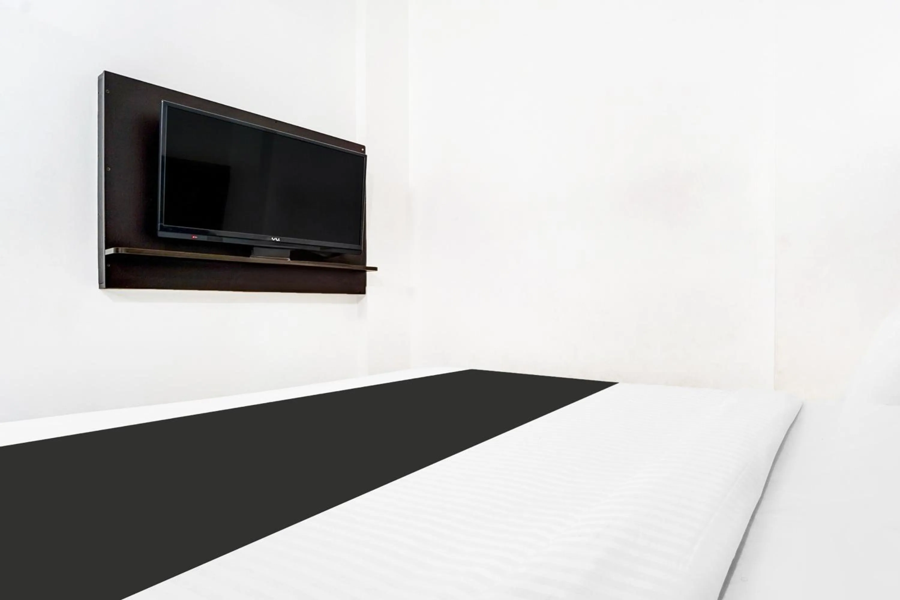 Bedroom, Bed in Super Hotel O Attukal Near Attakulangara Formerly Remya Residency