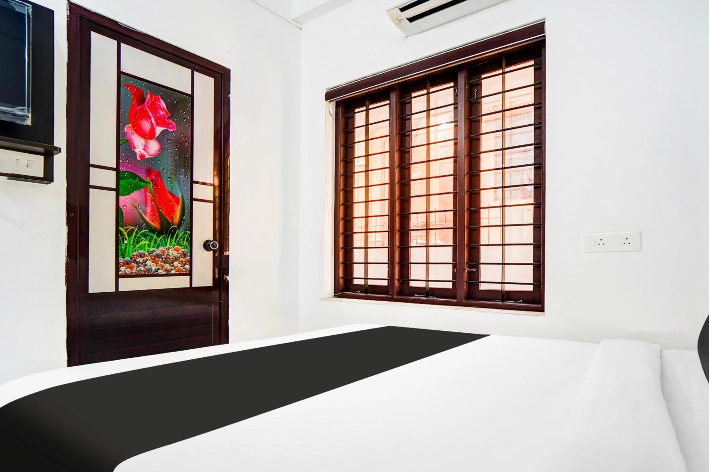 Bedroom, Bed in Super Hotel O Attukal Near Attakulangara Formerly Remya Residency