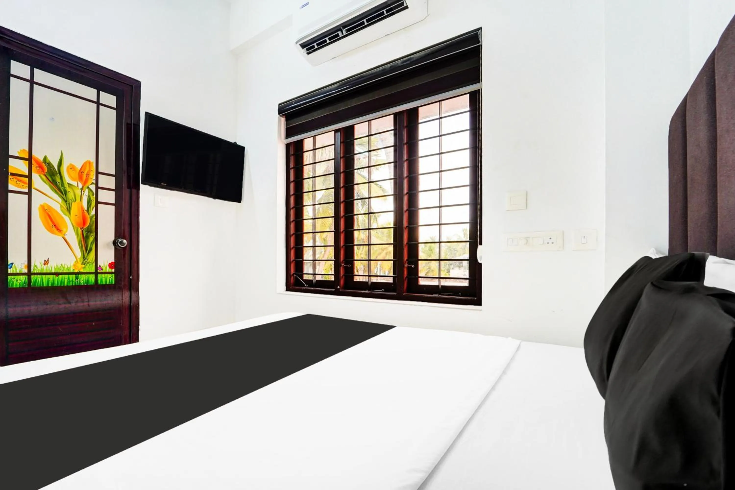 Bedroom, Bed in Super Hotel O Attukal Near Attakulangara Formerly Remya Residency