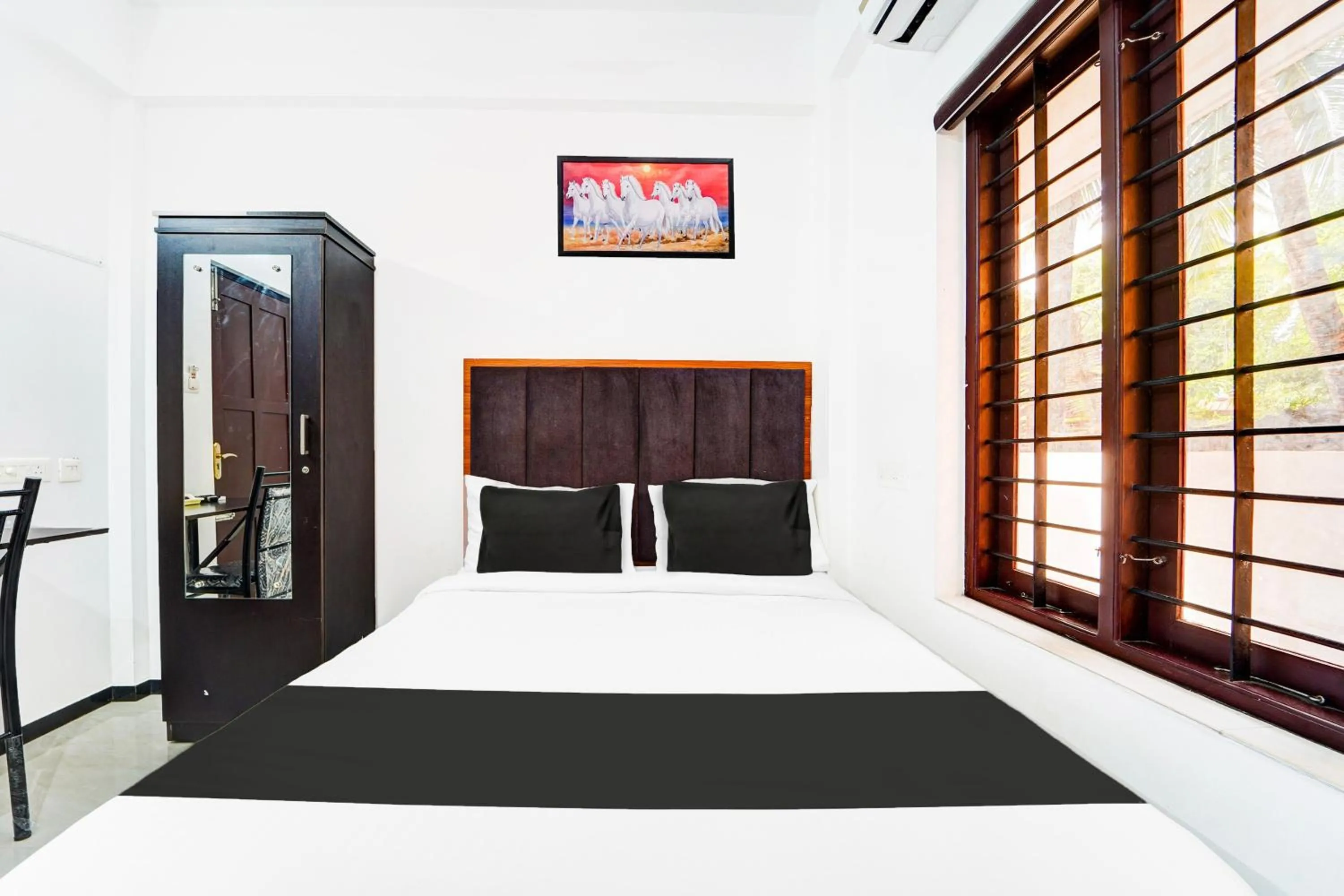 Bedroom, Bed in Super Hotel O Attukal Near Attakulangara Formerly Remya Residency