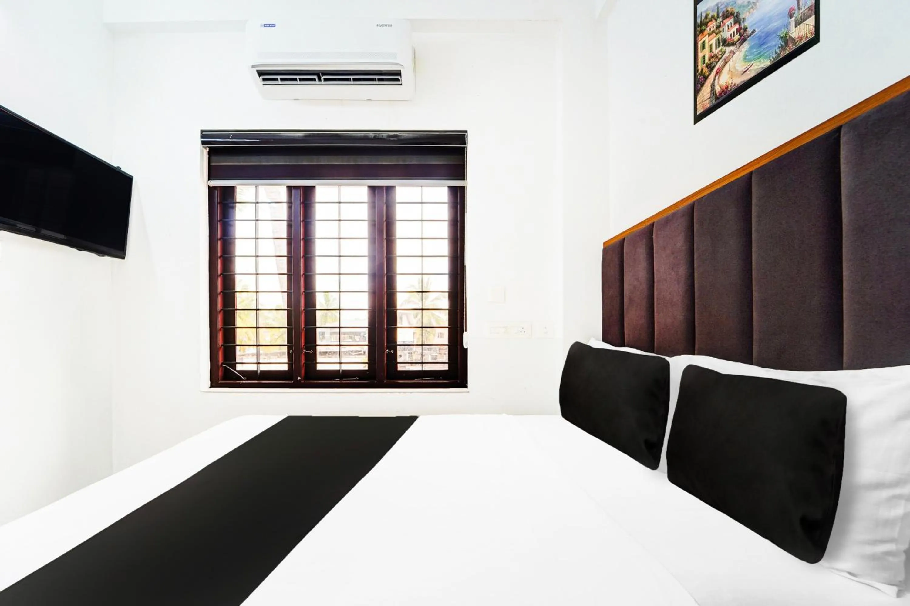 Bedroom, Bed in Super Hotel O Attukal Near Attakulangara Formerly Remya Residency