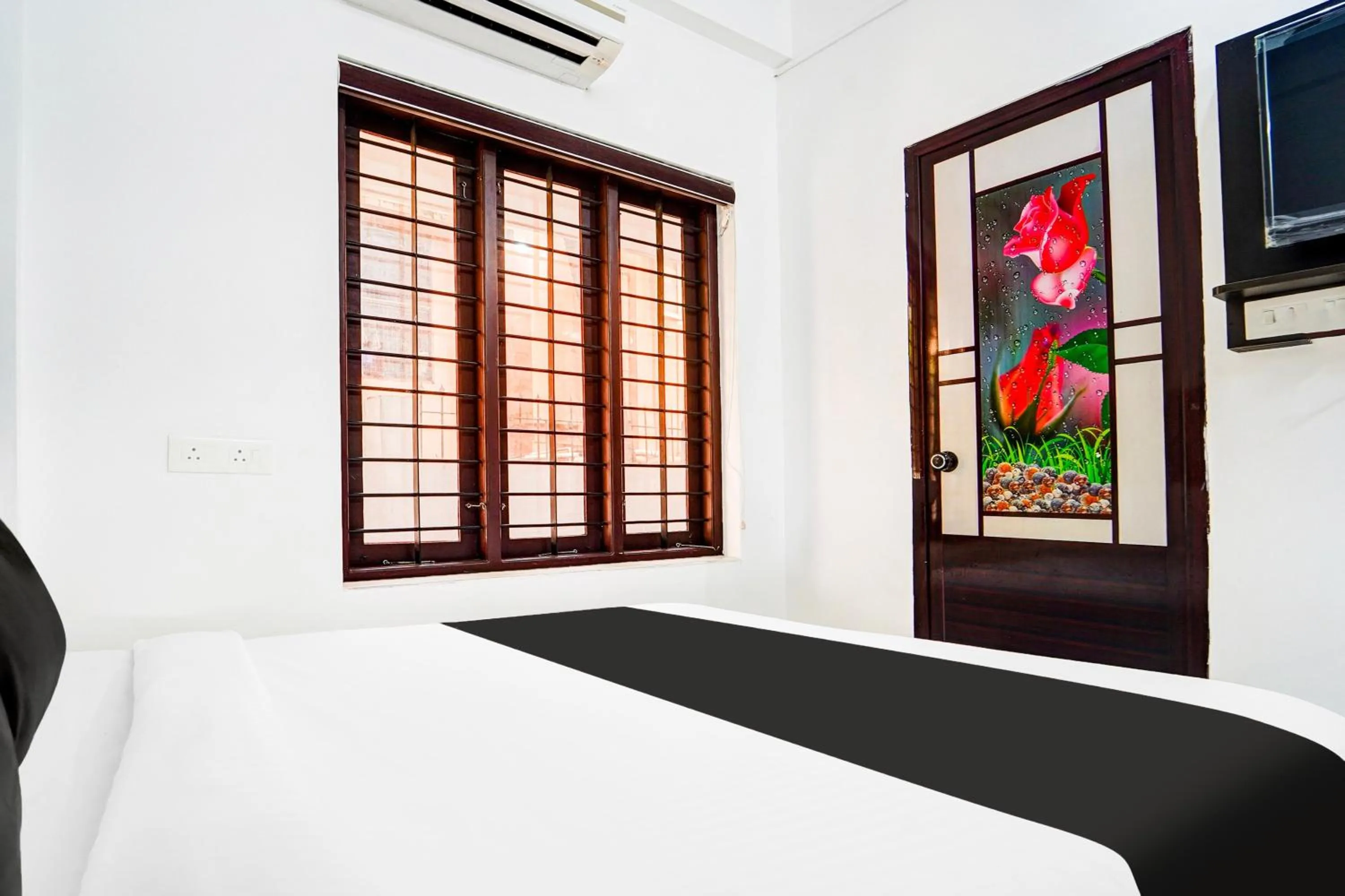 Bedroom, Bed in Super Hotel O Attukal Near Attakulangara Formerly Remya Residency