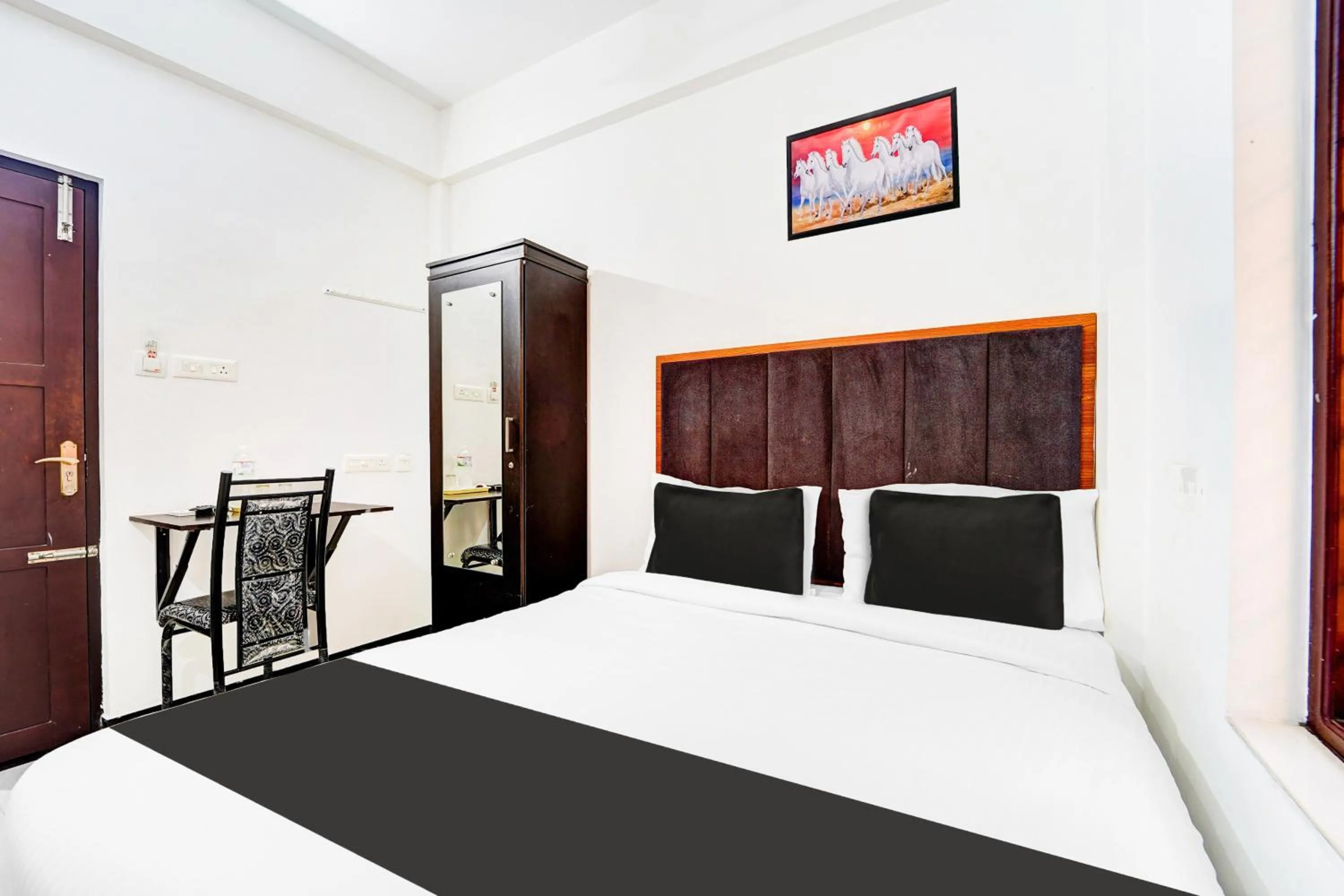 Bedroom, Bed in Super Hotel O Attukal Near Attakulangara Formerly Remya Residency