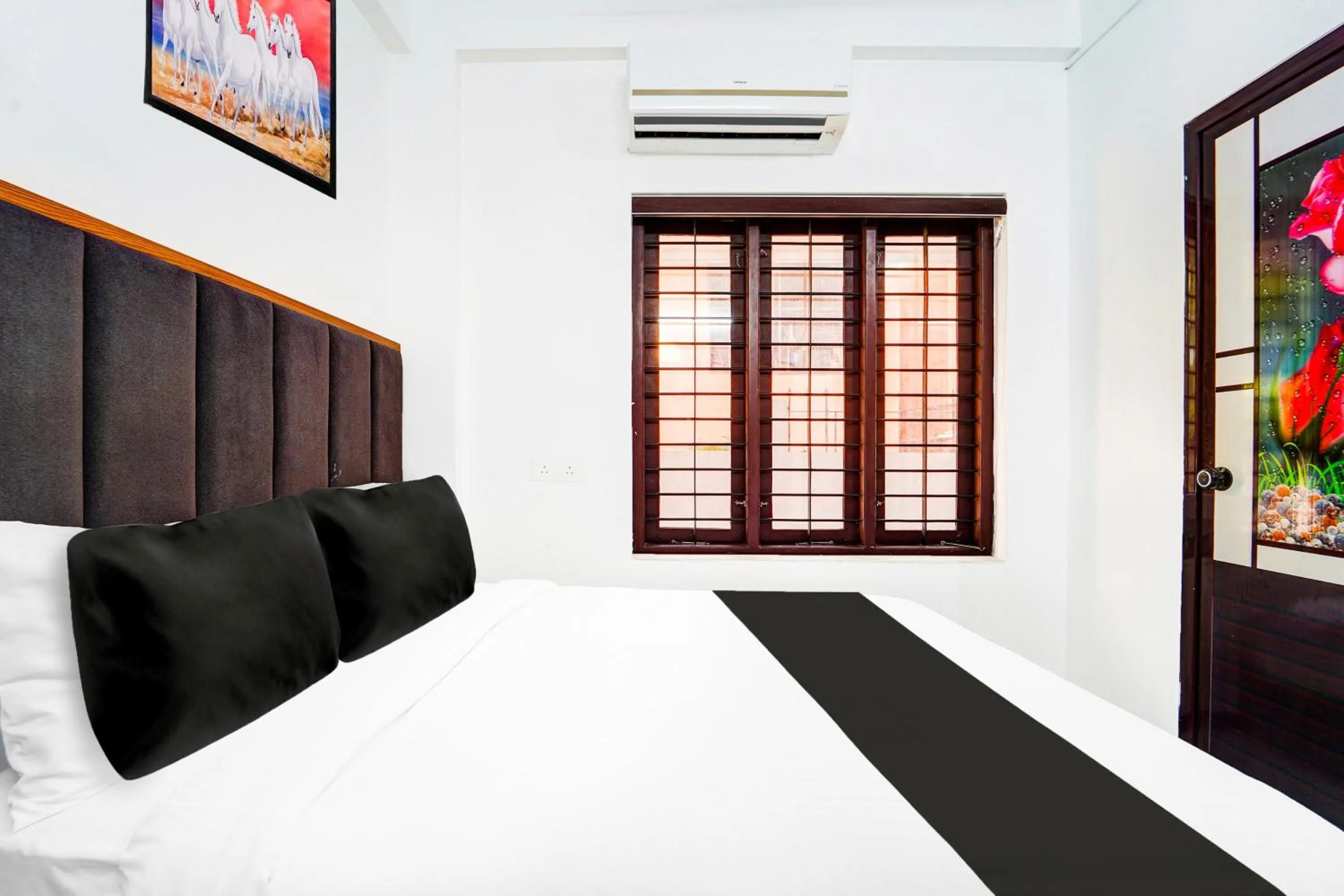 Bedroom, Bed in Super Hotel O Attukal Near Attakulangara Formerly Remya Residency