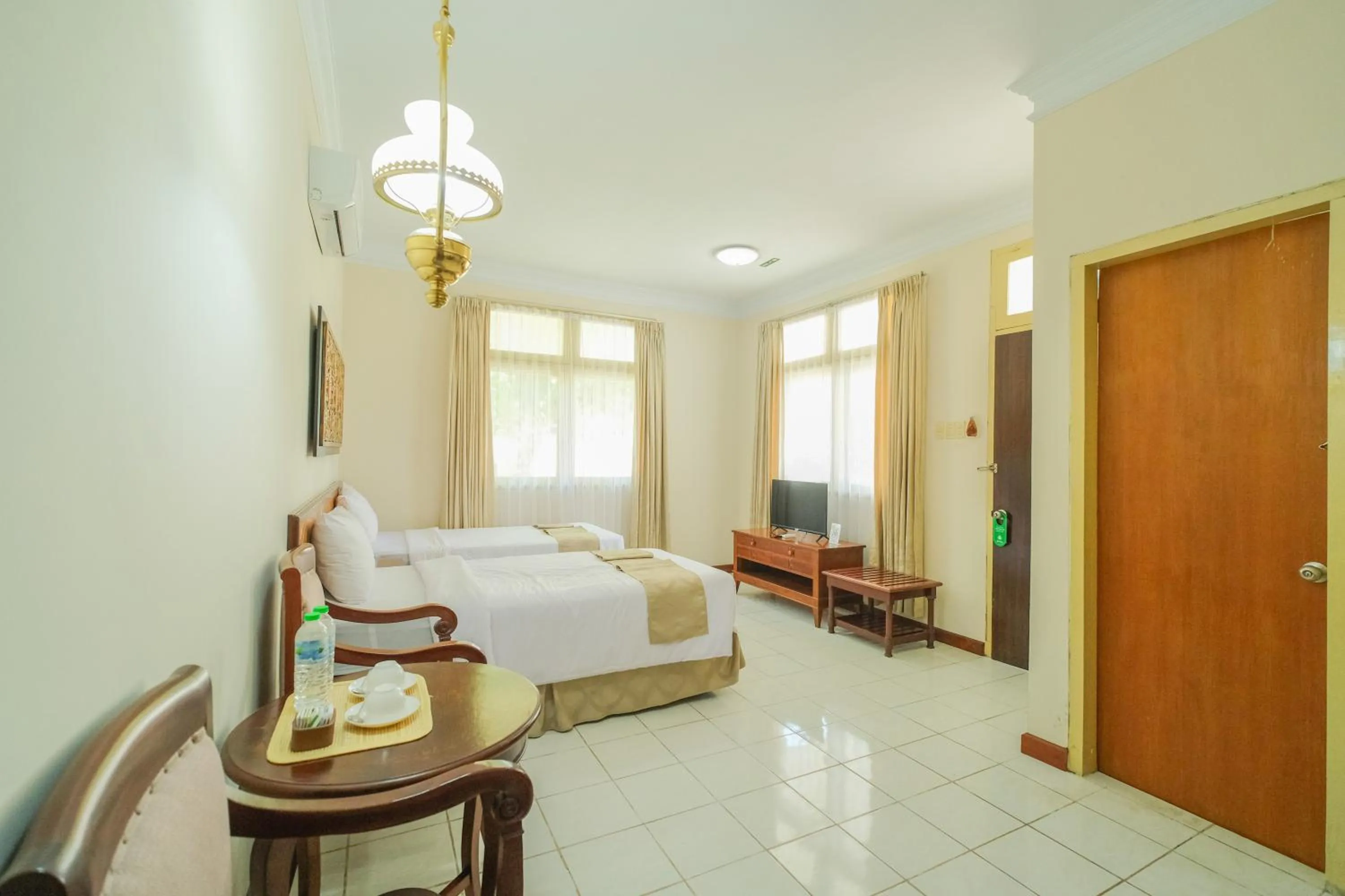 Bed in Royal Brongto Hotel