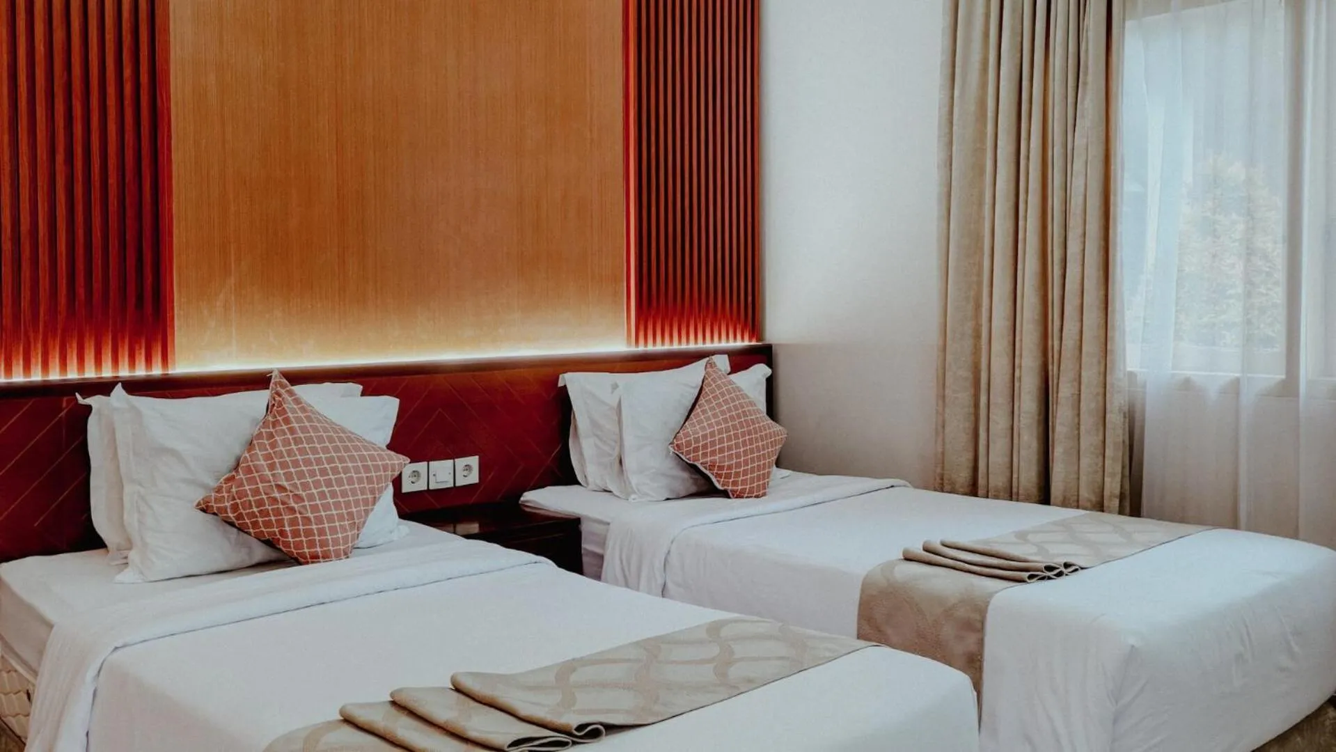 Bed in Royal Brongto Hotel