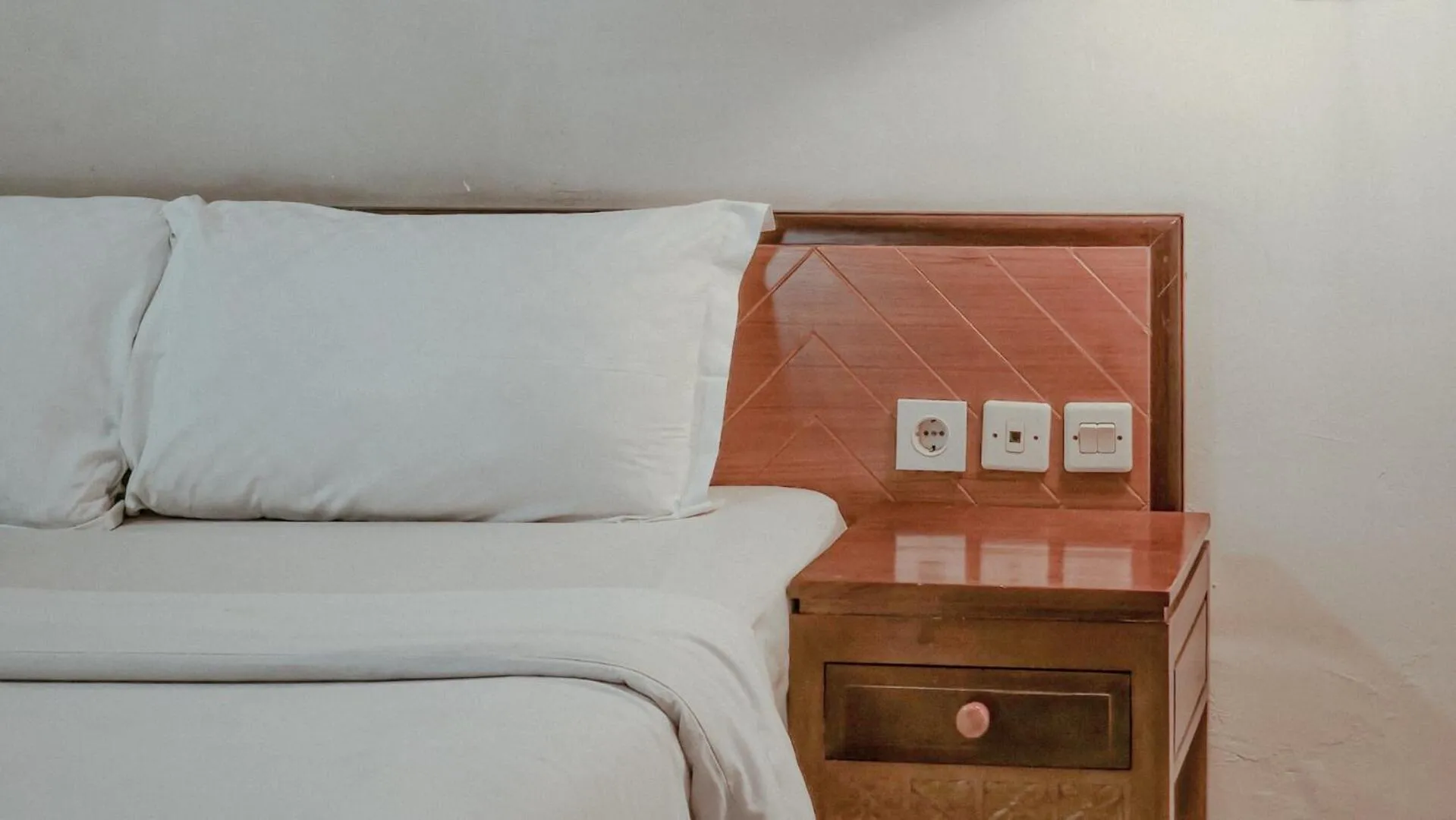 Bed in Royal Brongto Hotel