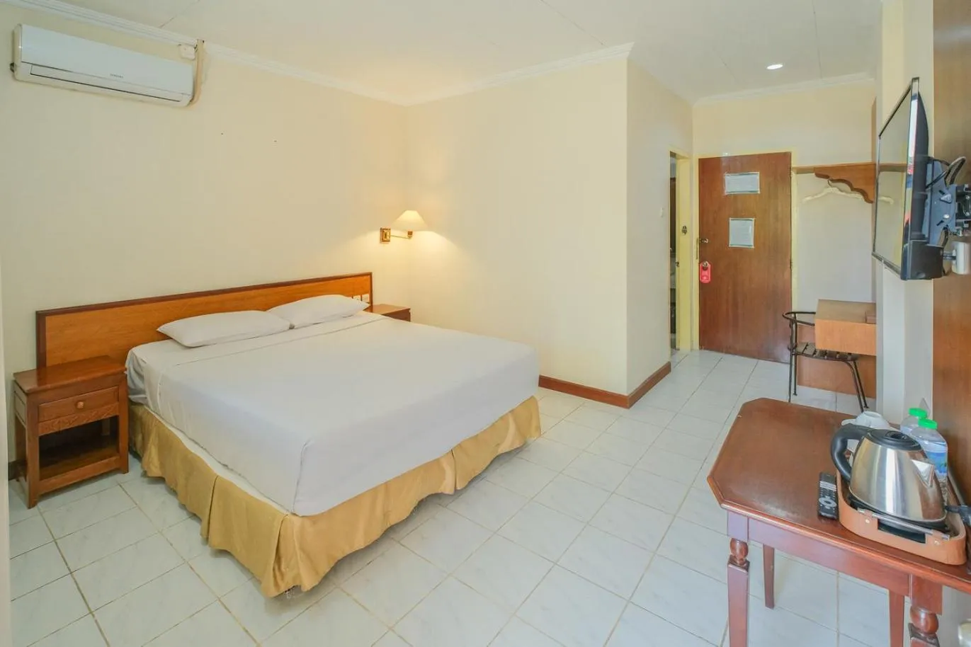 Bed in Royal Brongto Hotel