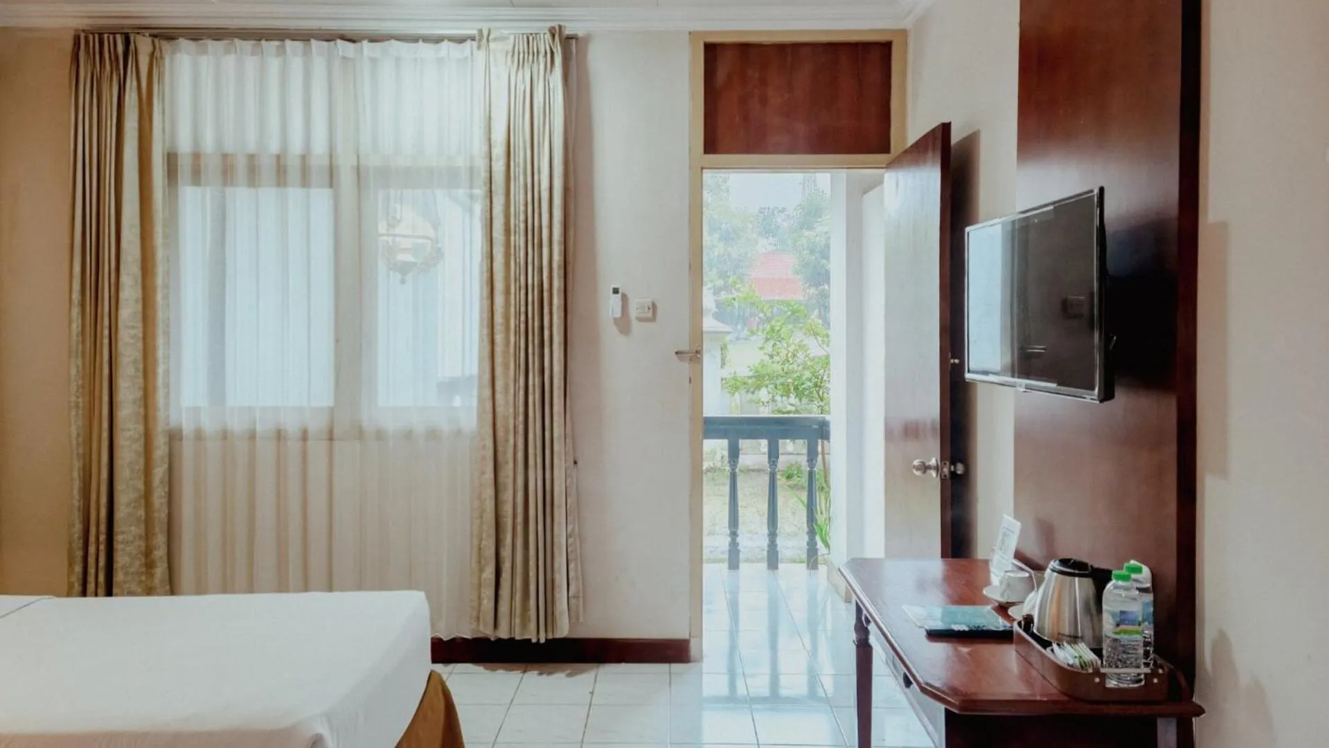 Bed in Royal Brongto Hotel