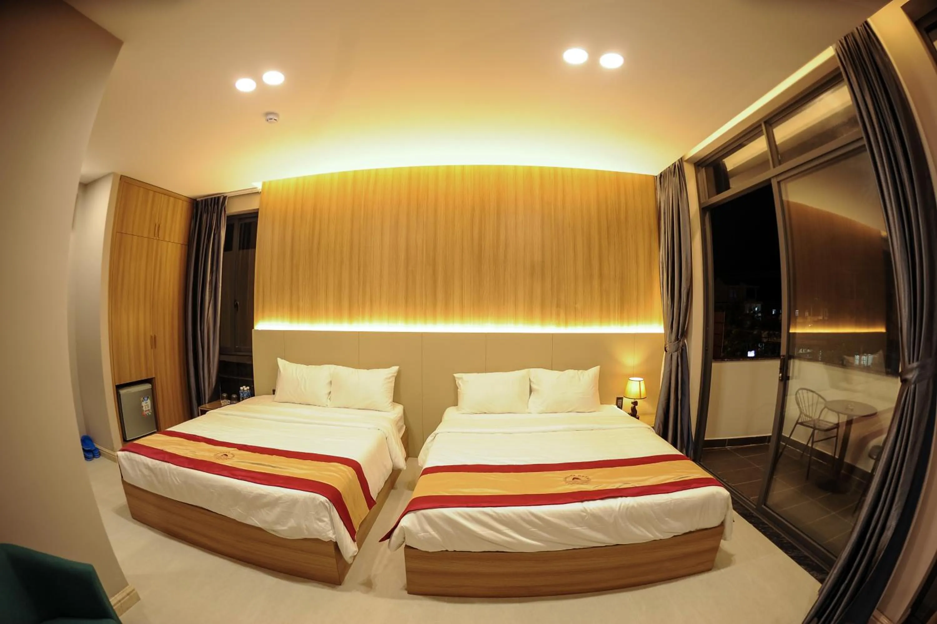 Bed in LAHONA HOTEL