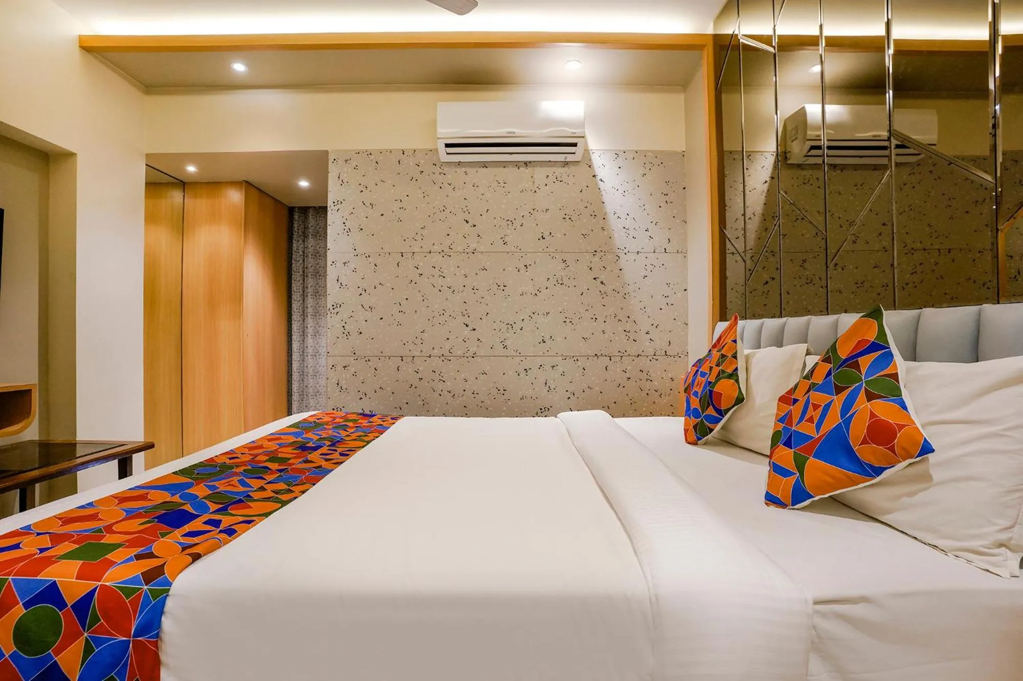 Bed in FabHotel Springs Lodging