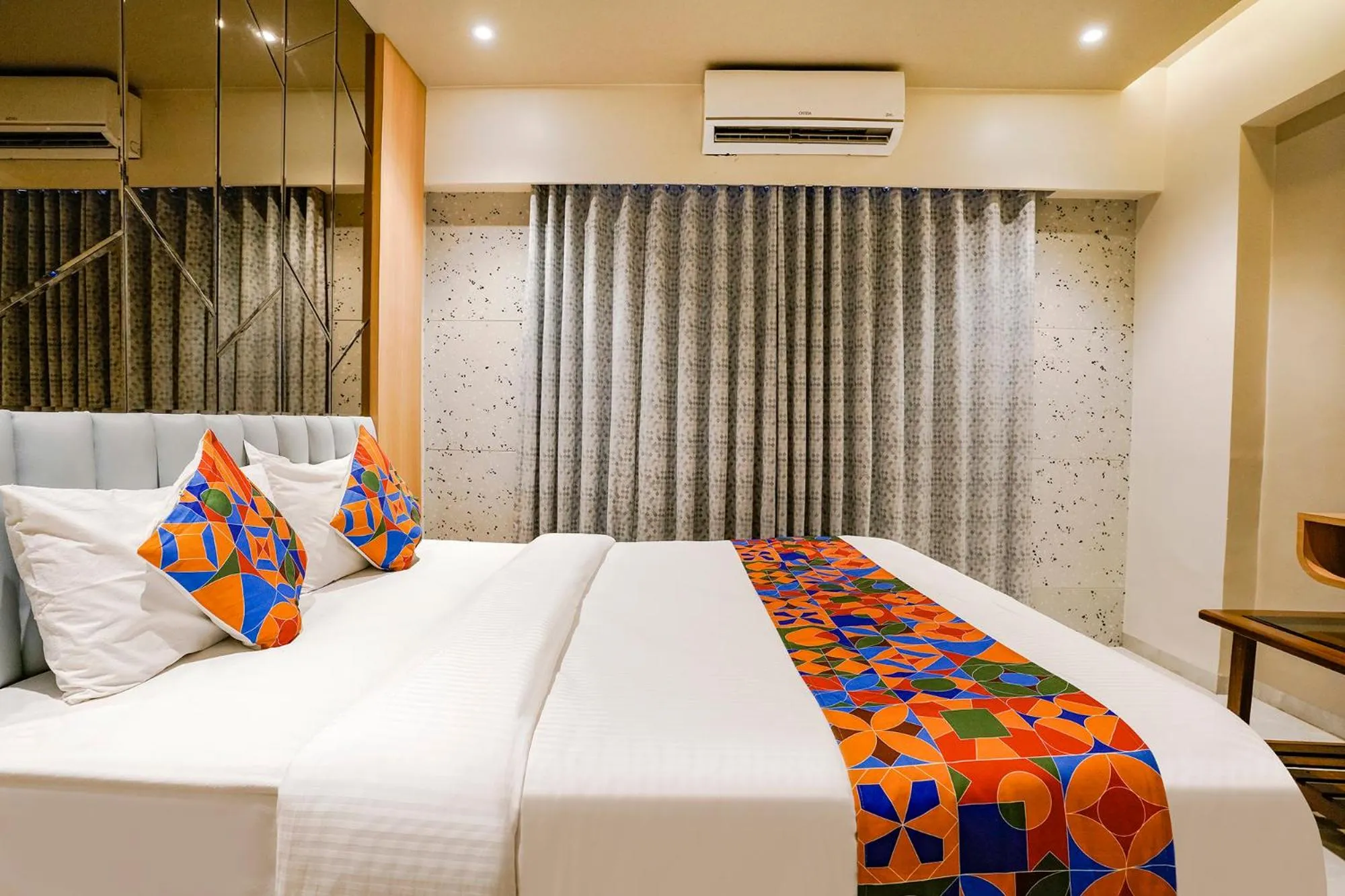 Bed in FabHotel Springs Lodging