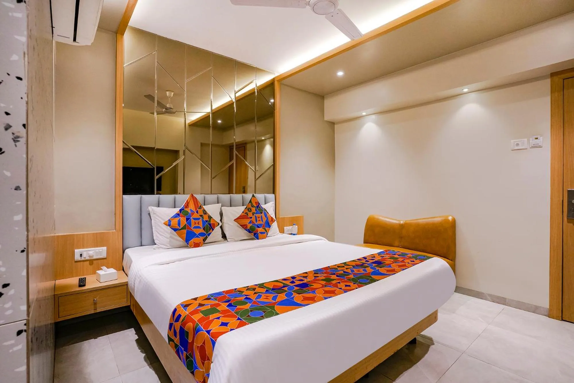 Bed in FabHotel Springs Lodging