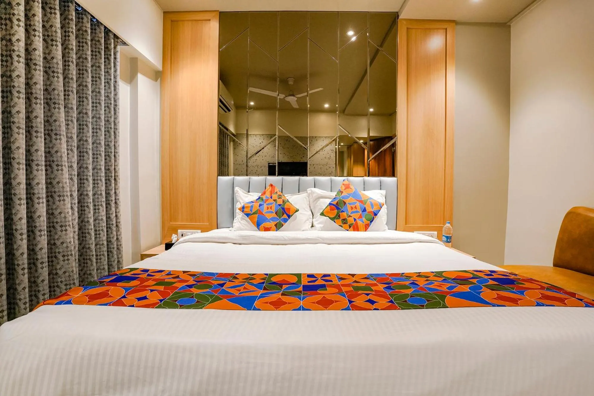 Bed in FabHotel Springs Lodging