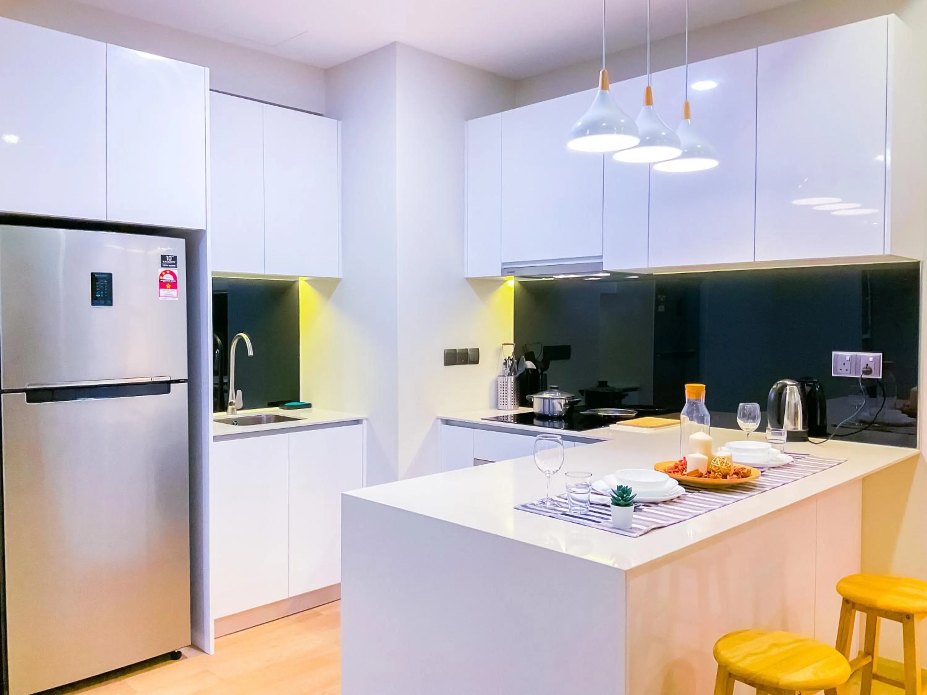 Kitchen or kitchenette in AXQUISITE SUITES at KLCC