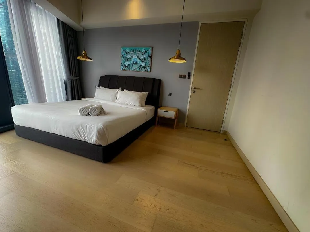 Bed in AXQUISITE SUITES at KLCC