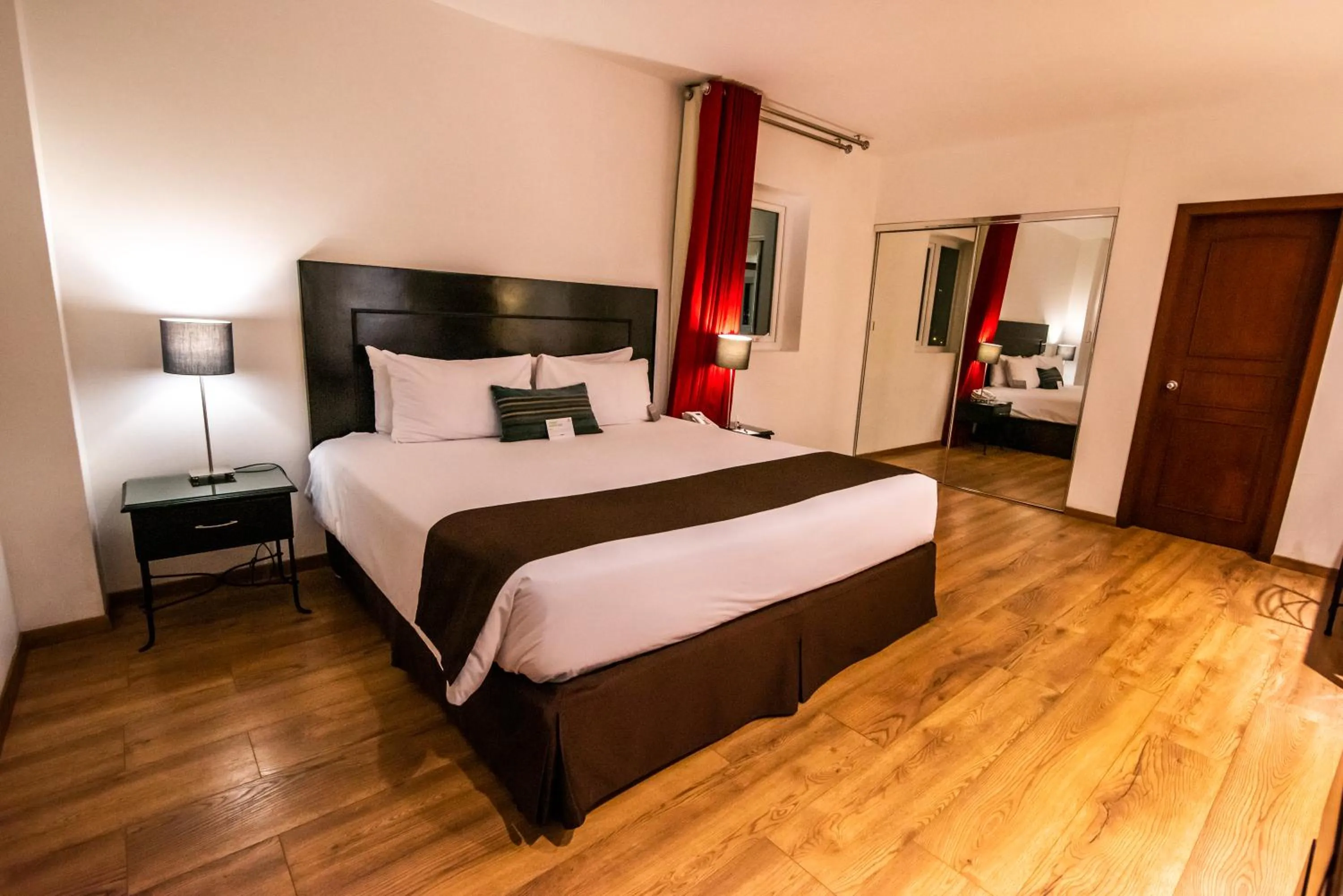 Photo of the whole room, Bed in El Polo Hotel & Suites