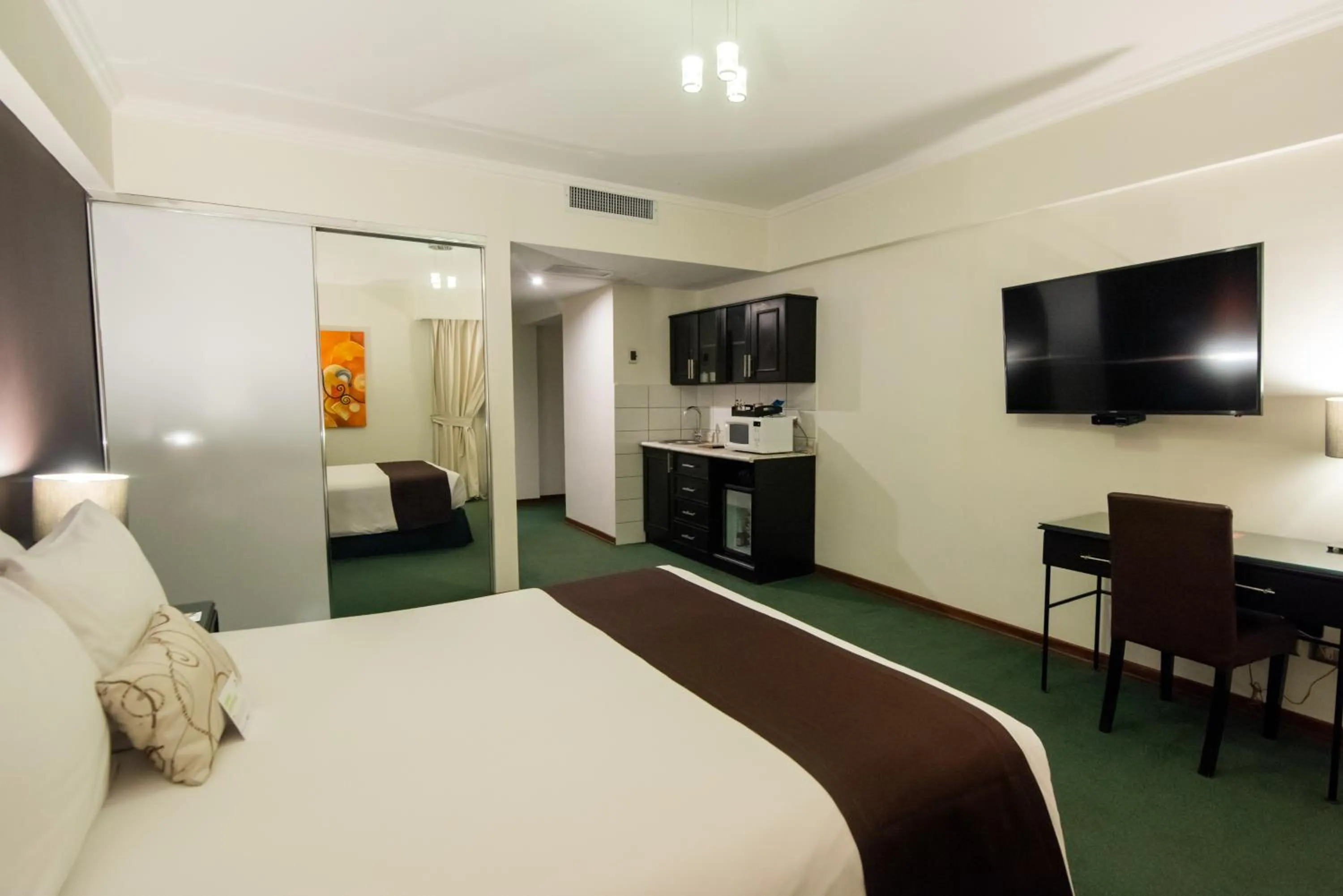 Photo of the whole room, Bed in El Polo Hotel & Suites