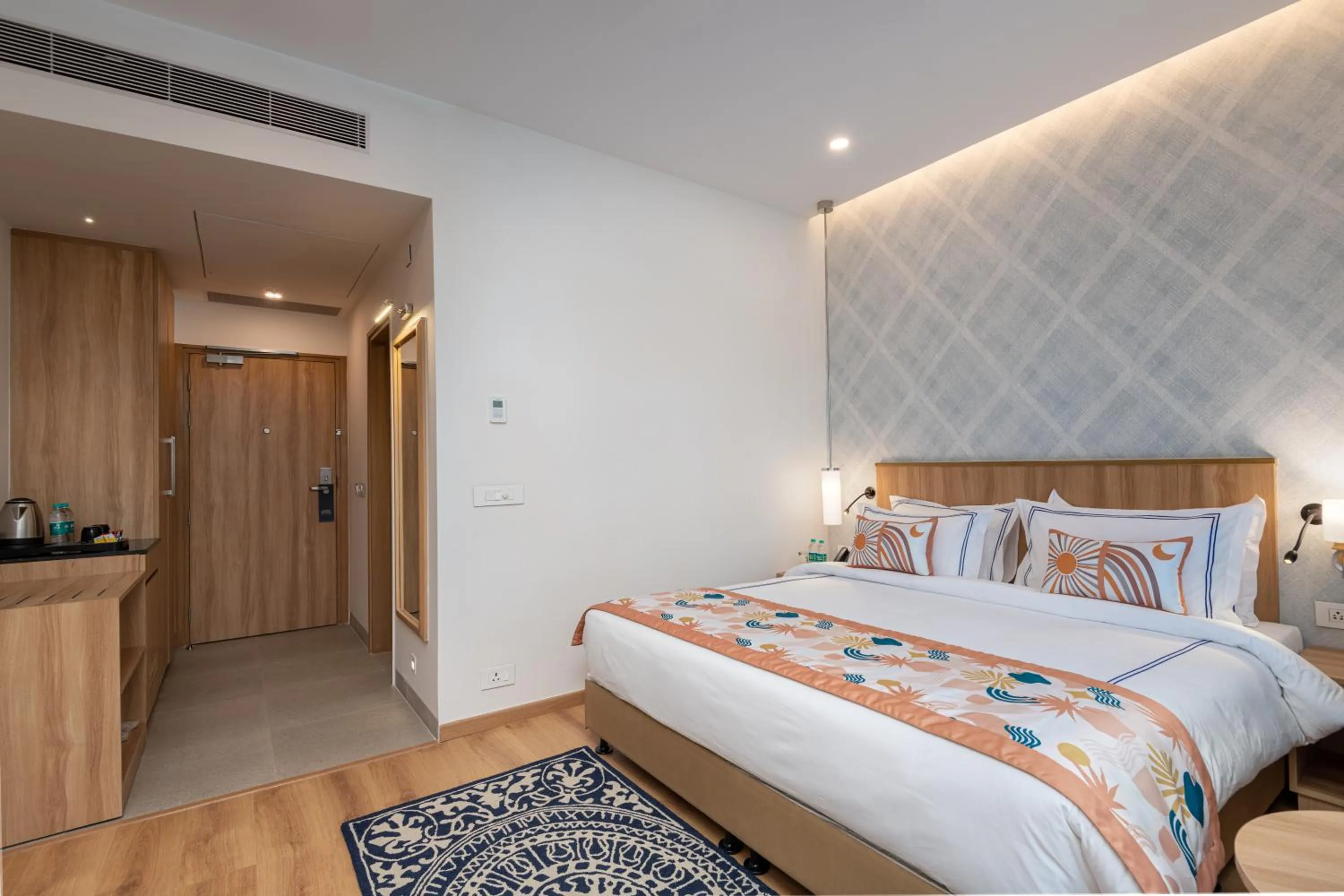 Bed in ExpoInn Suites and Convention