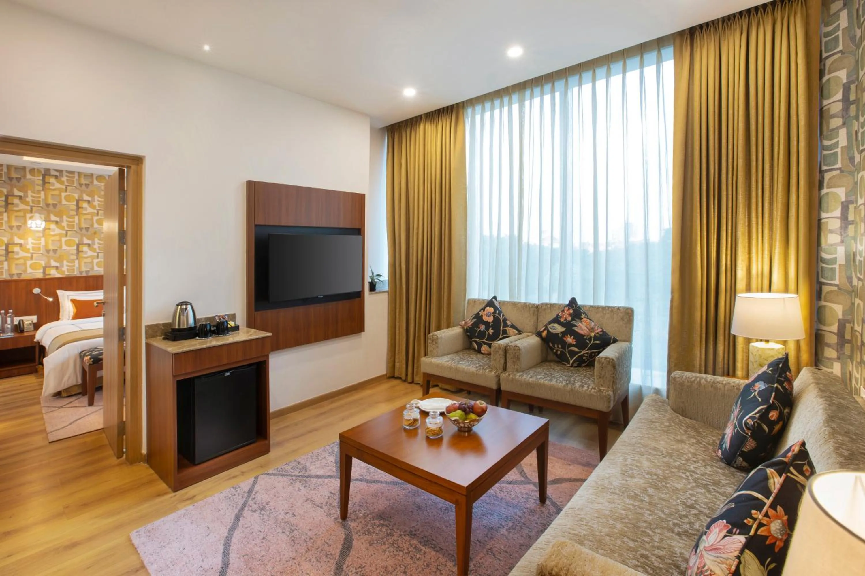 Bed in ExpoInn Suites and Convention