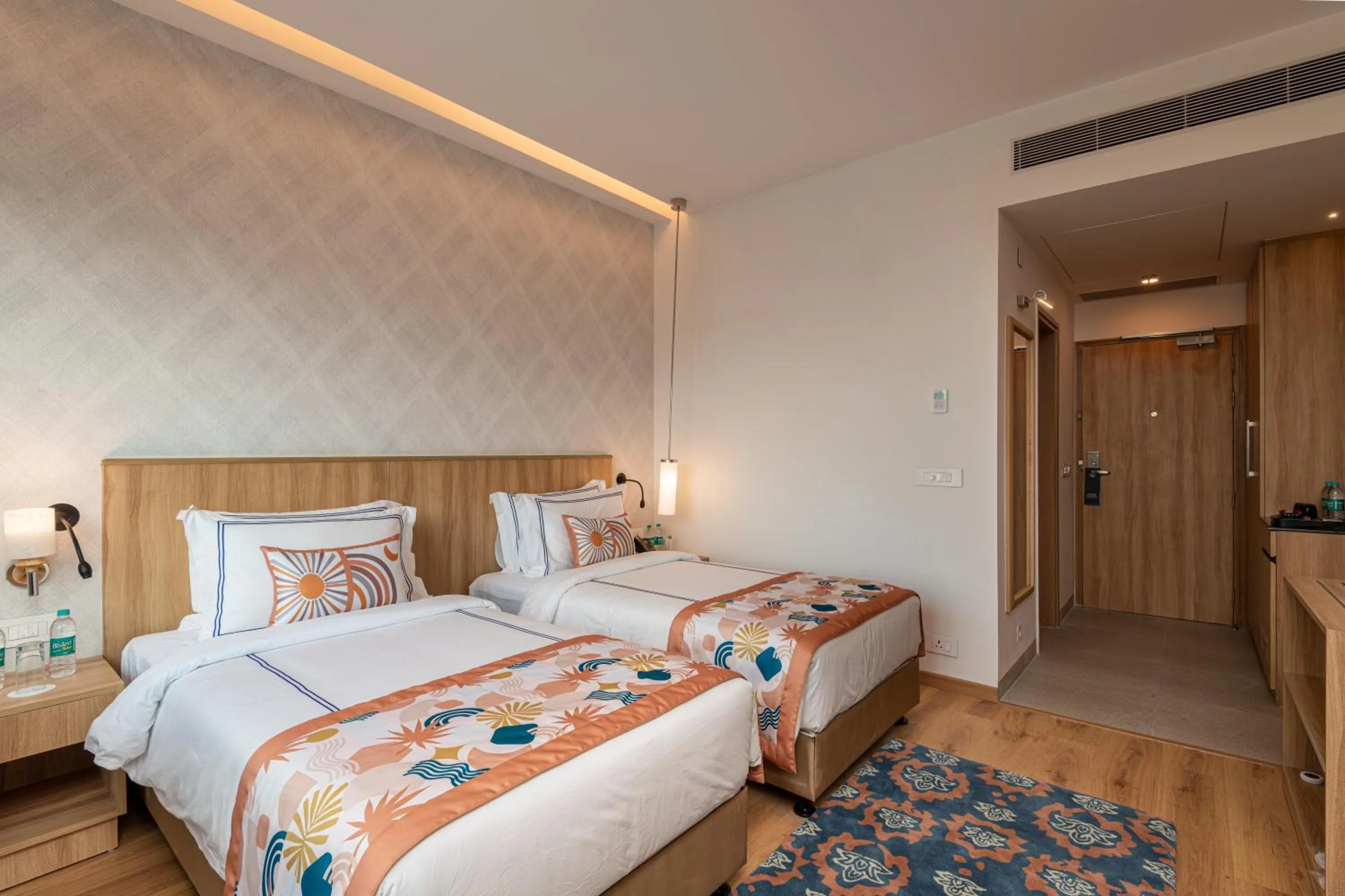 Bed in ExpoInn Suites and Convention