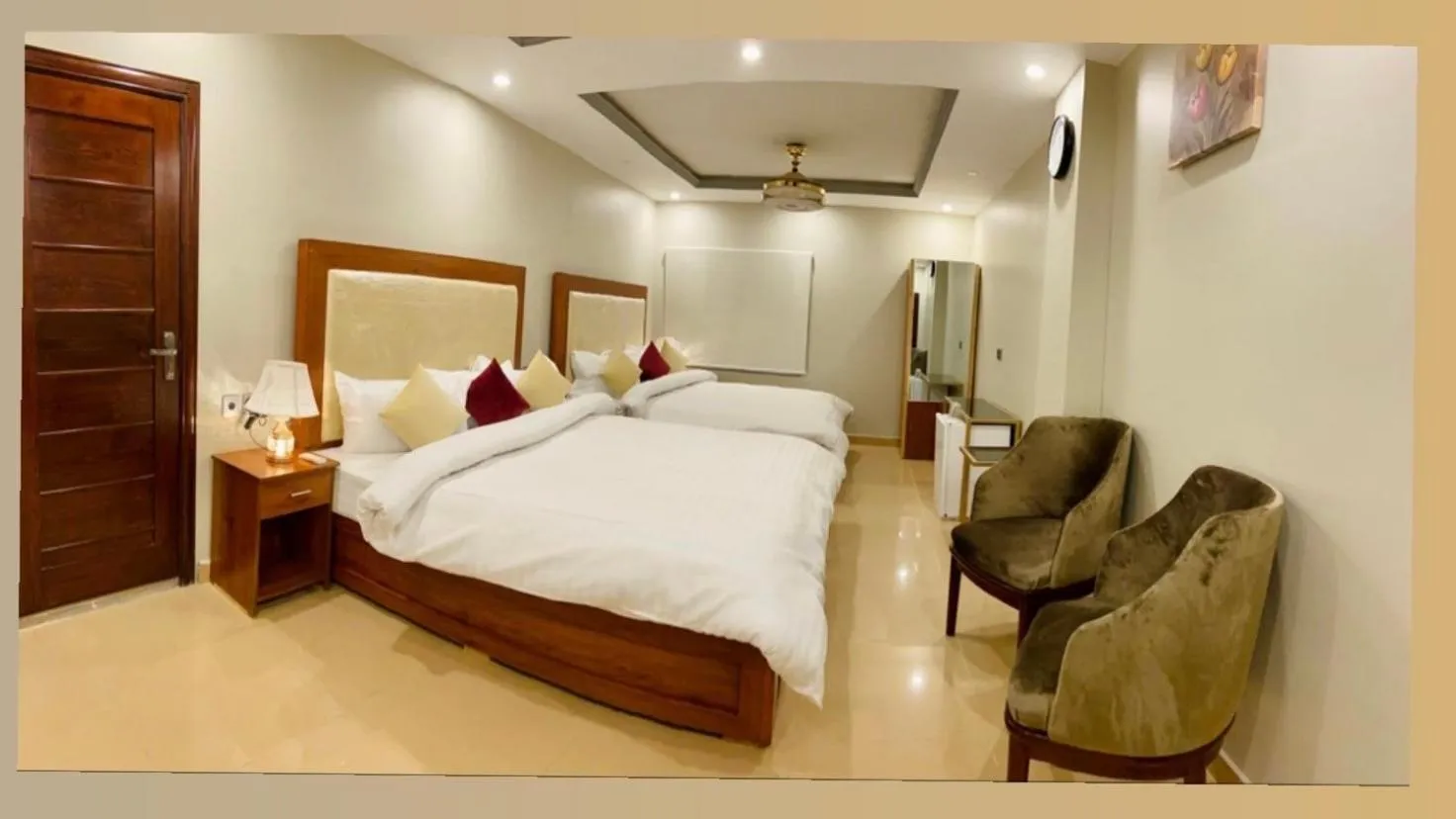 Bed in Grand Luxury Hotel Multan