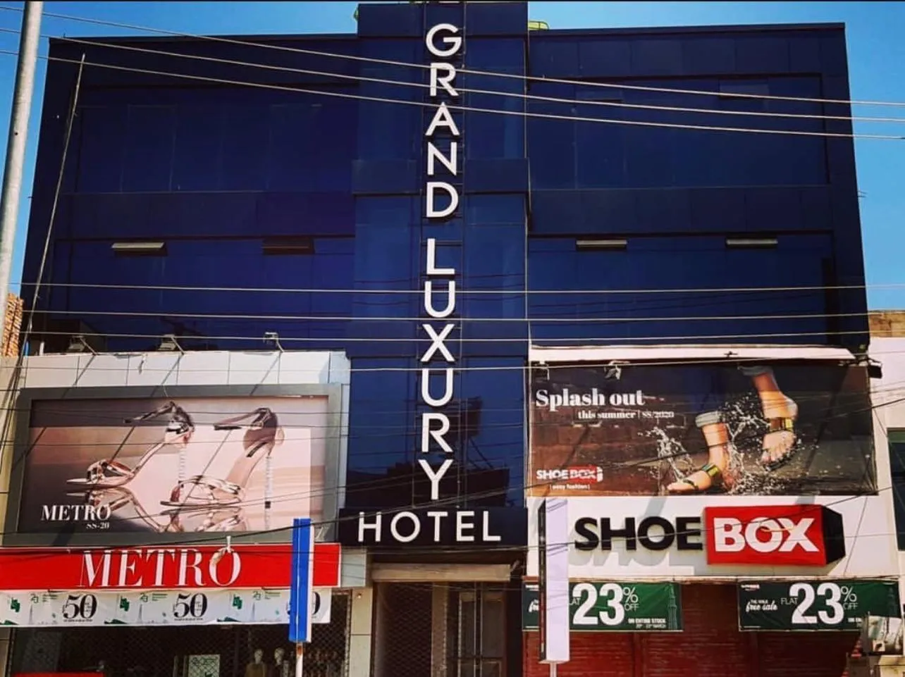 Property logo or sign in Grand Luxury Hotel Multan