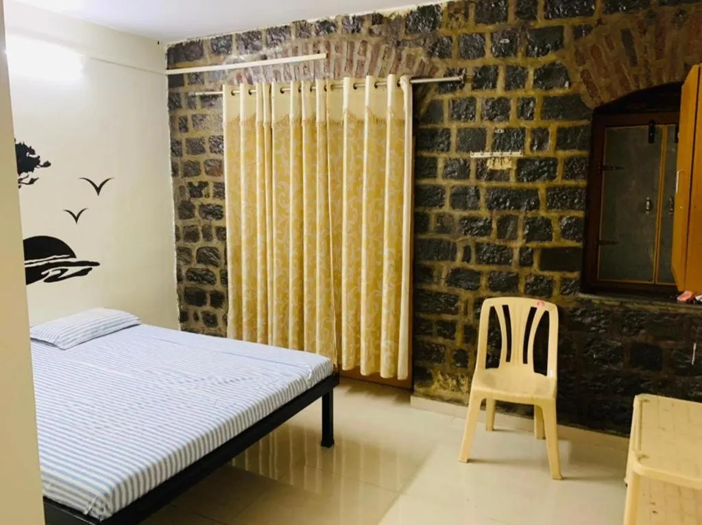 Bedroom in Hotel Rukmini, kolhapur