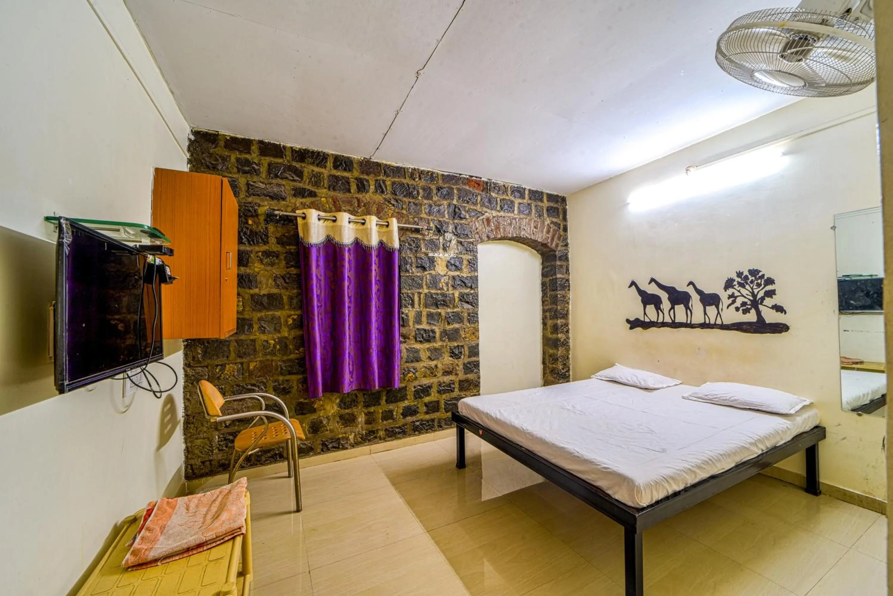 Bedroom in Hotel Rukmini, kolhapur