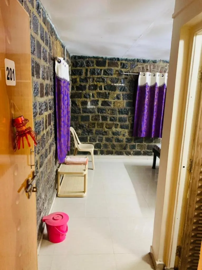 Bedroom in Hotel Rukmini, kolhapur