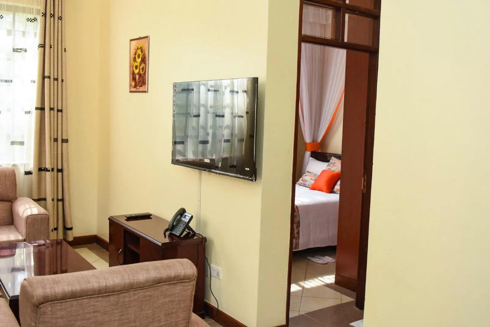 Living room, Bed in The Radix Hotel Limited