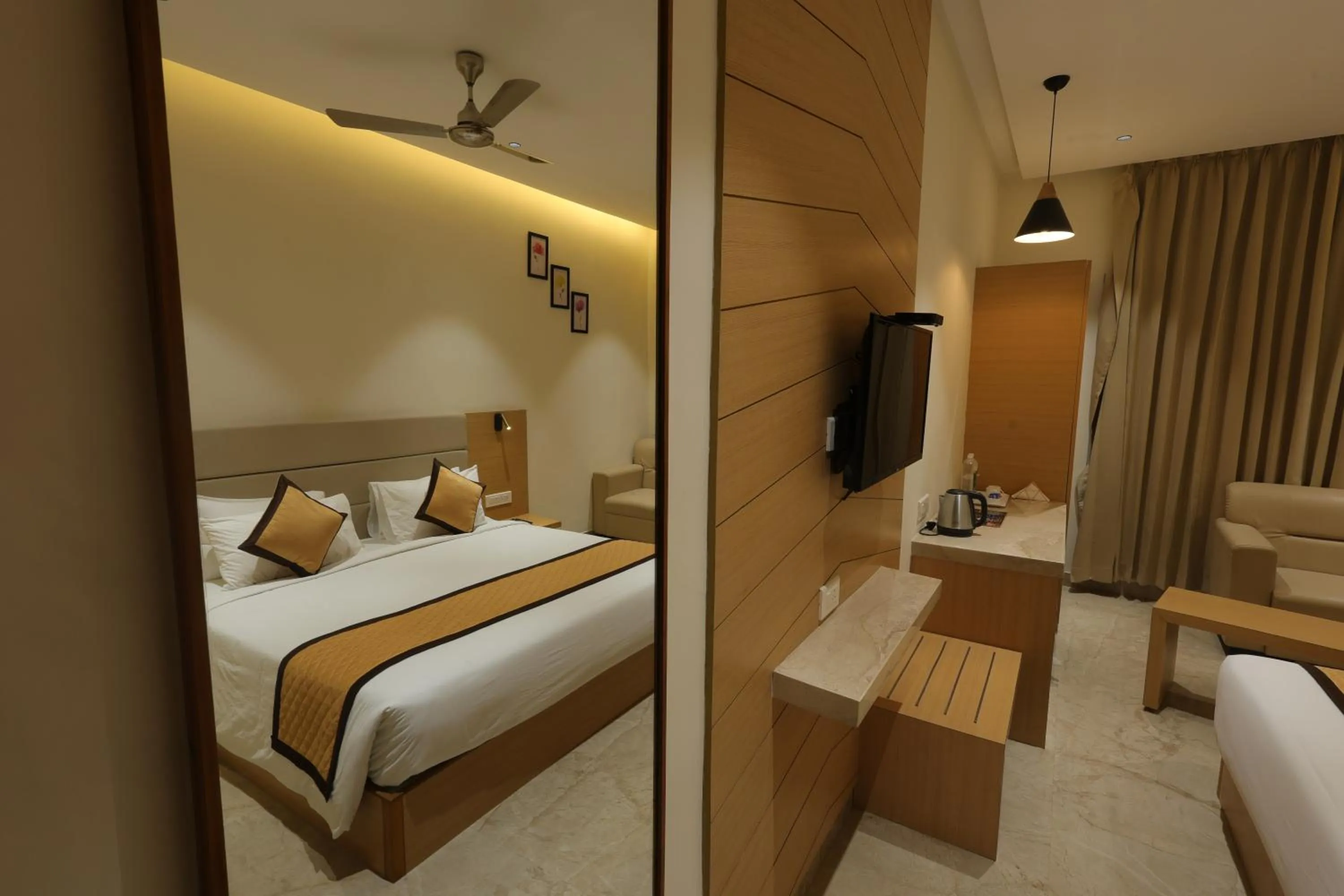 Living room, Bed in Hotel Nakshathra- A Royal Stay