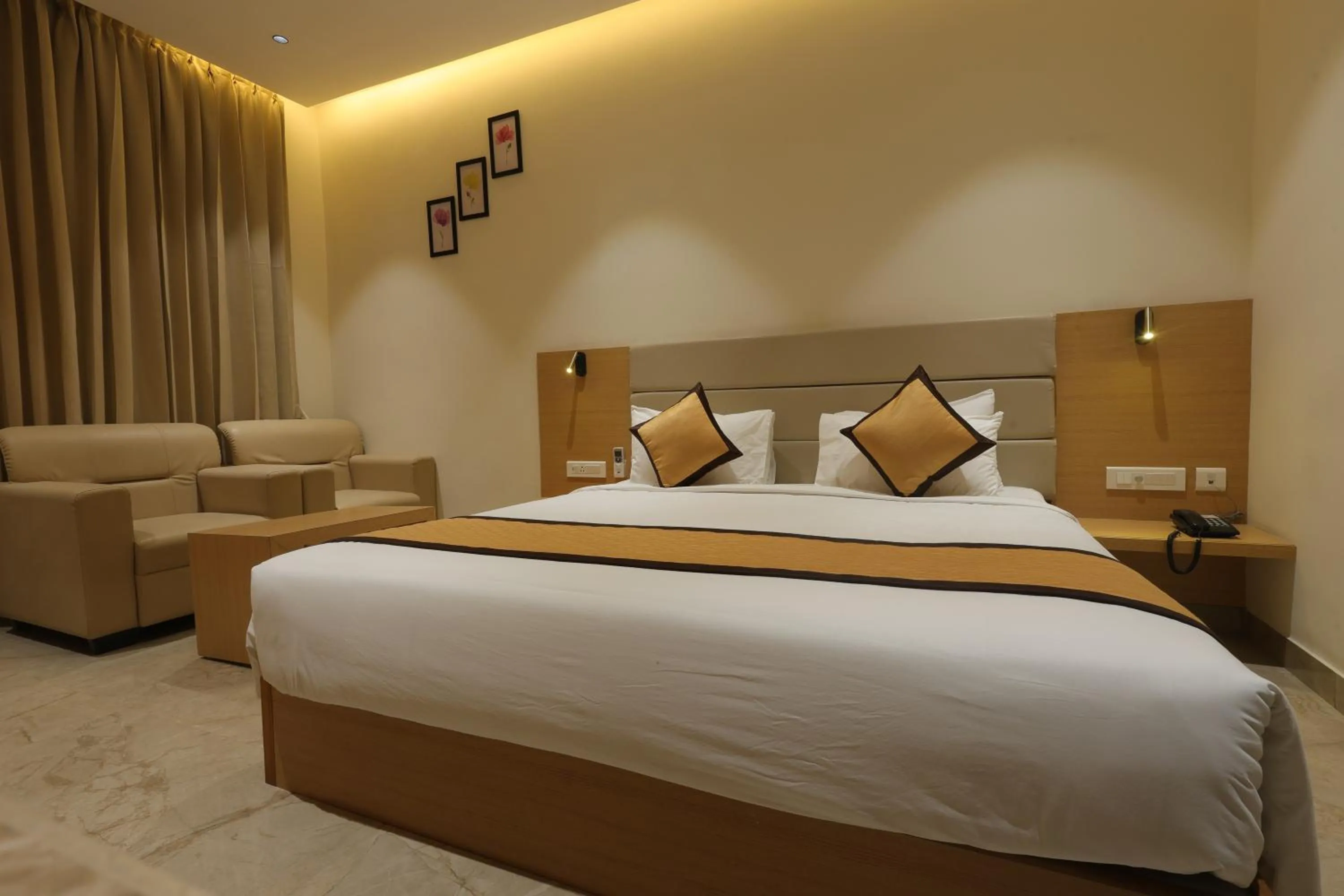 Photo of the whole room, Bed in Hotel Nakshathra- A Royal Stay