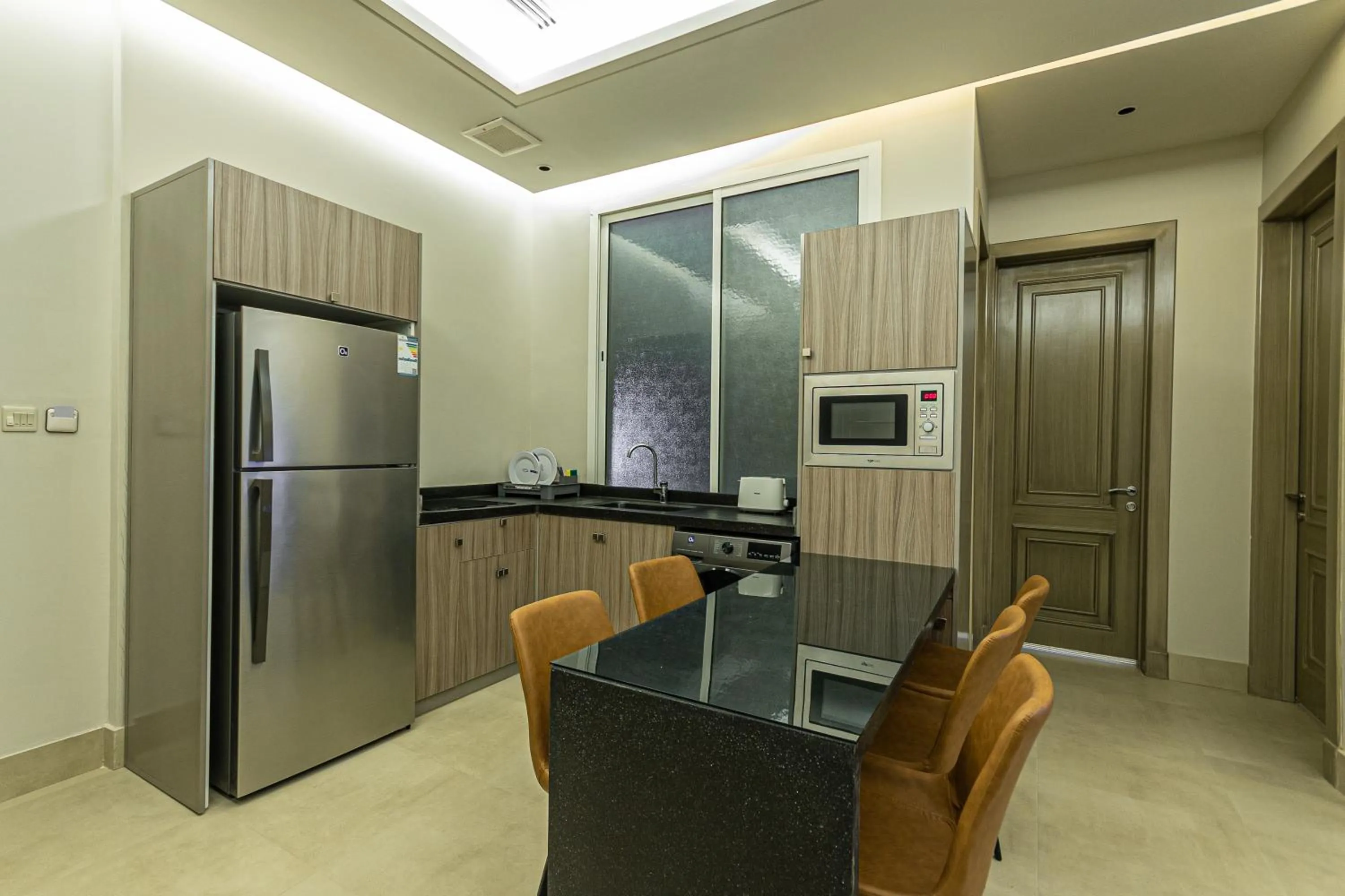 Kitchen or kitchenette in Land Walk Hotel Al Taawun Riyadh