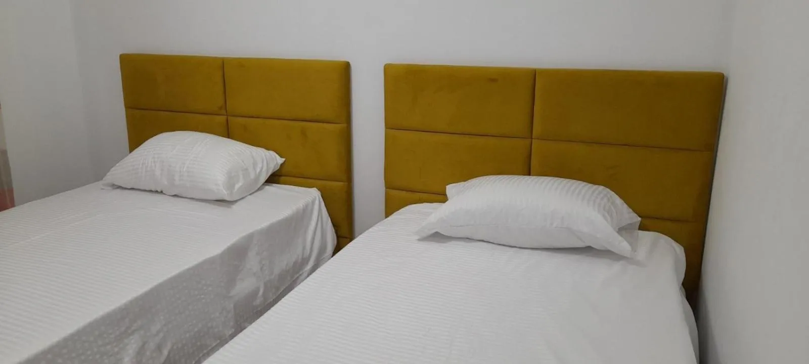 Bedroom, Bed in Dodona ApartHotel in Prishtina