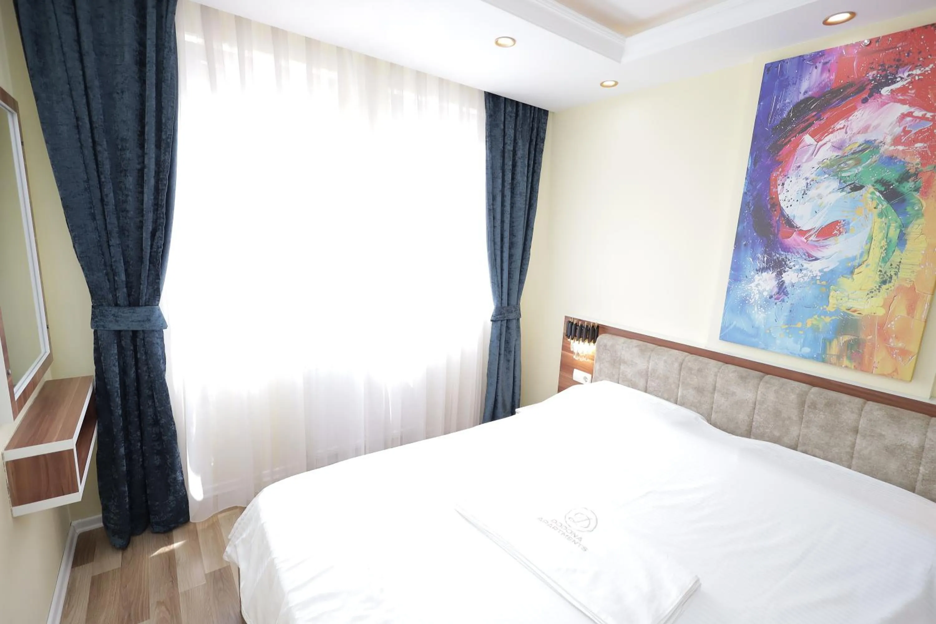 Bedroom, Bed in Dodona ApartHotel in Prishtina