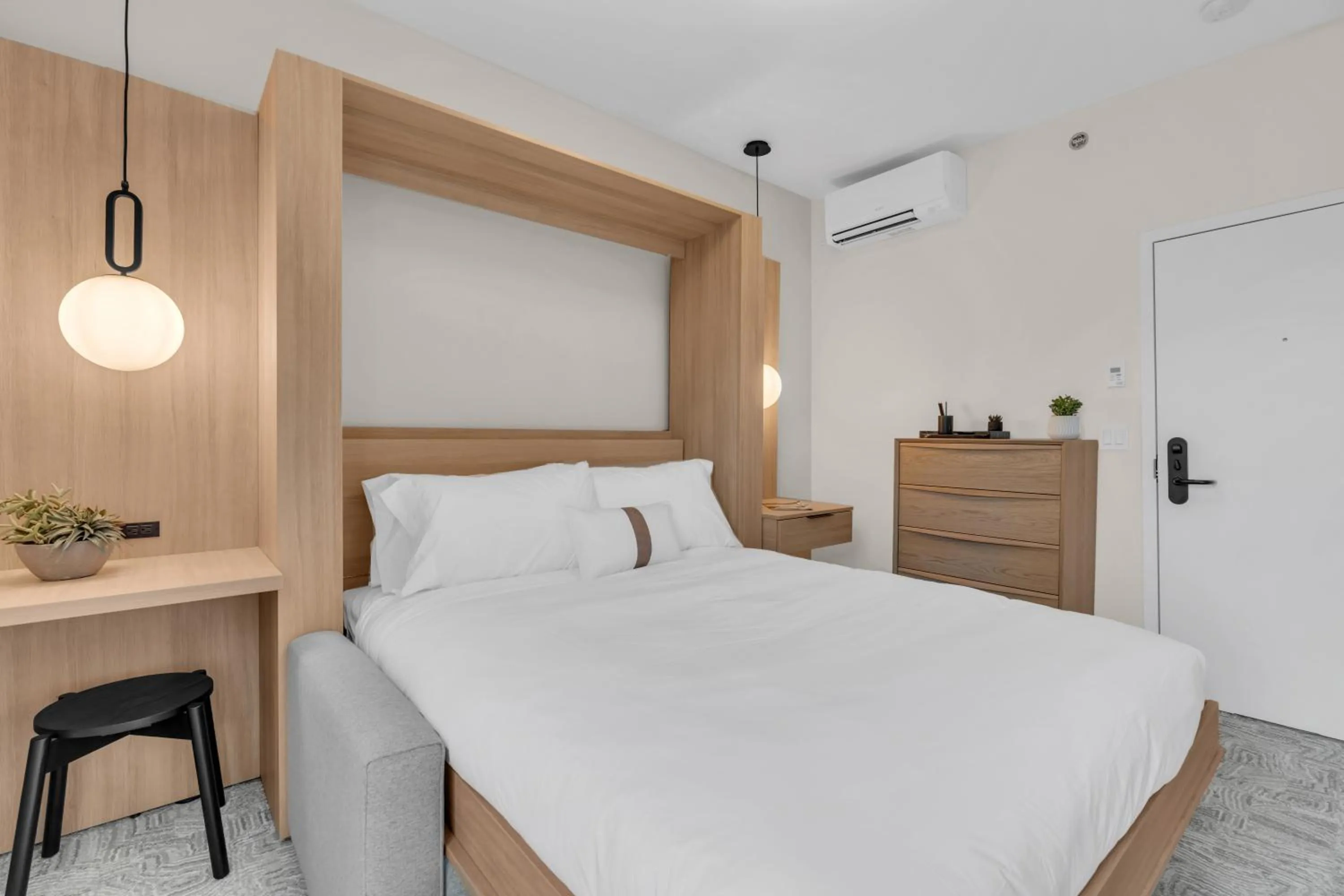 Bed in The St Laurent Guest Rooms