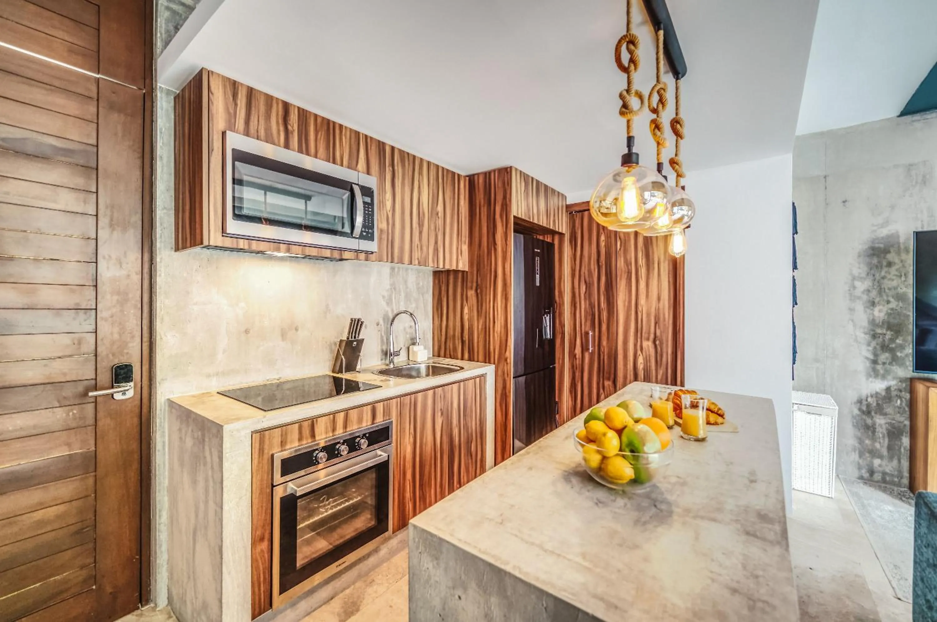 Kitchen or kitchenette in Incredible 1BR Swim Up with Private Cenote and Big Gym