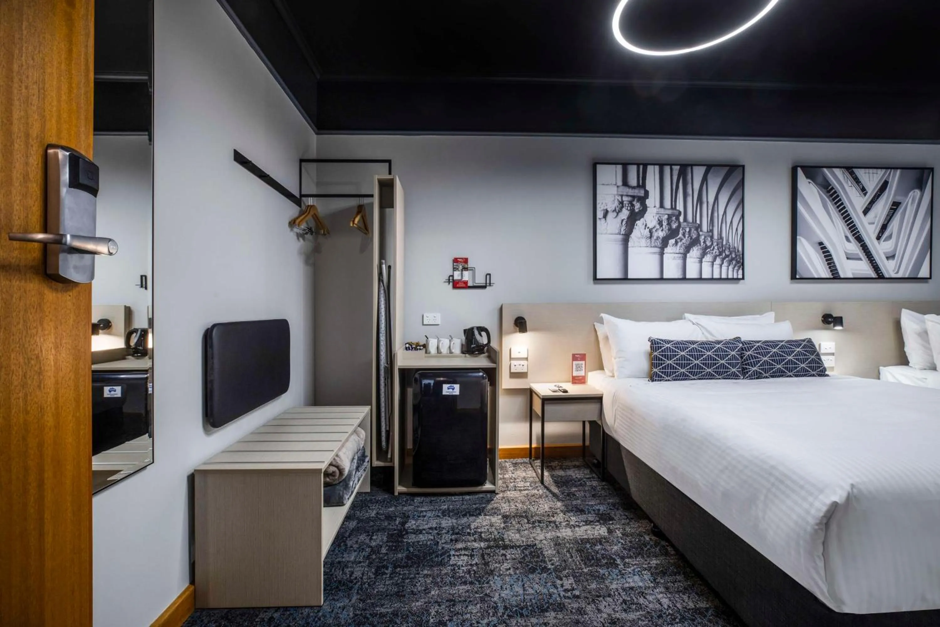 Bedroom, Bed in Nightcap at Empire Hotel