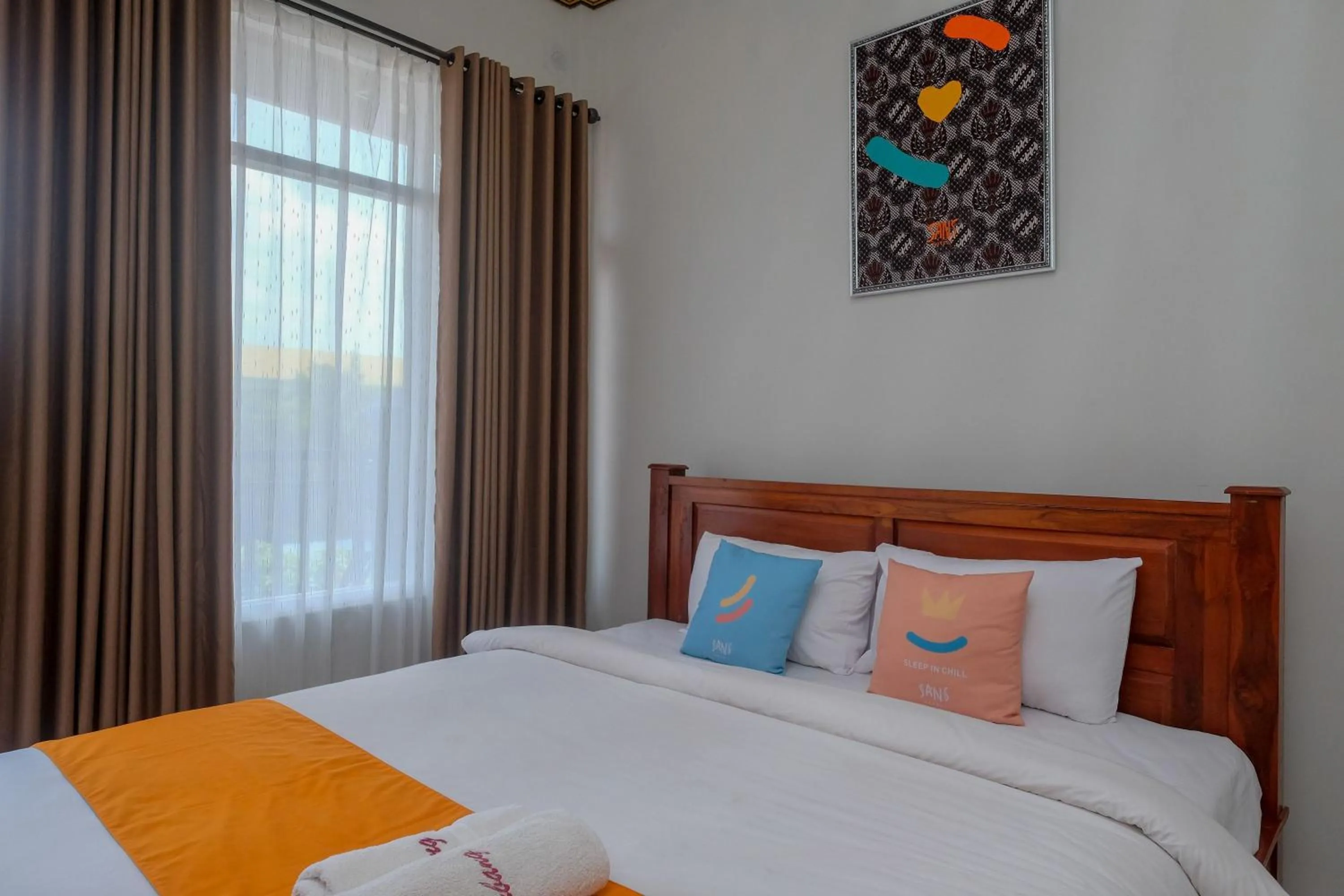 Bedroom, Bed in Sans Hotel Kumbang Yogyakarta by RedDoorz